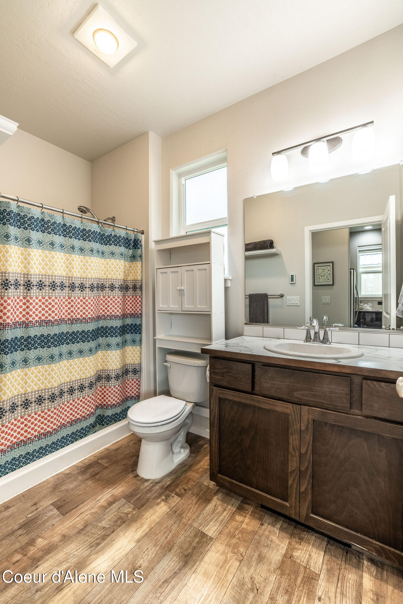 7028 N MADELLAINE DR