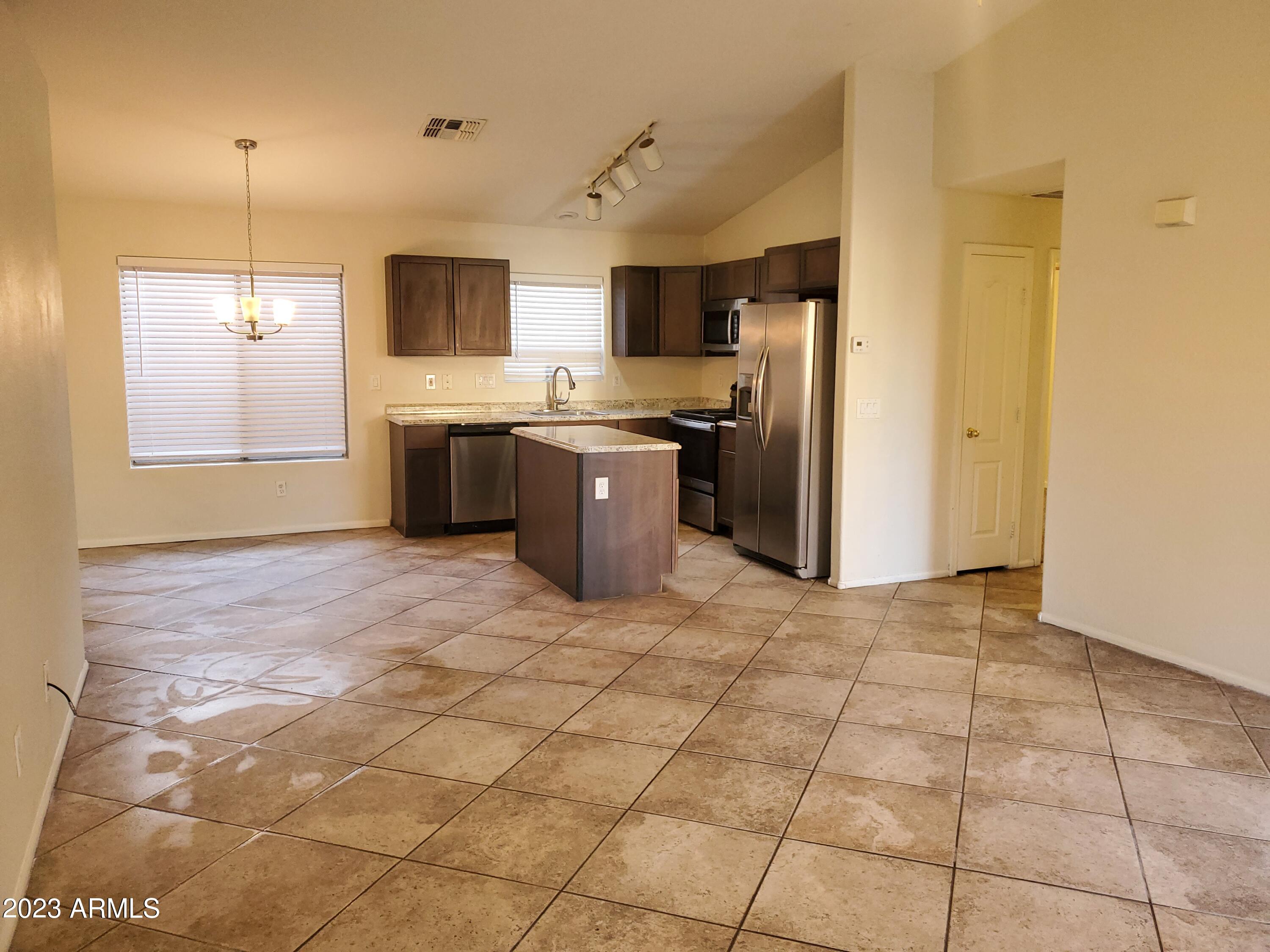 10901 W LEWIS Avenue