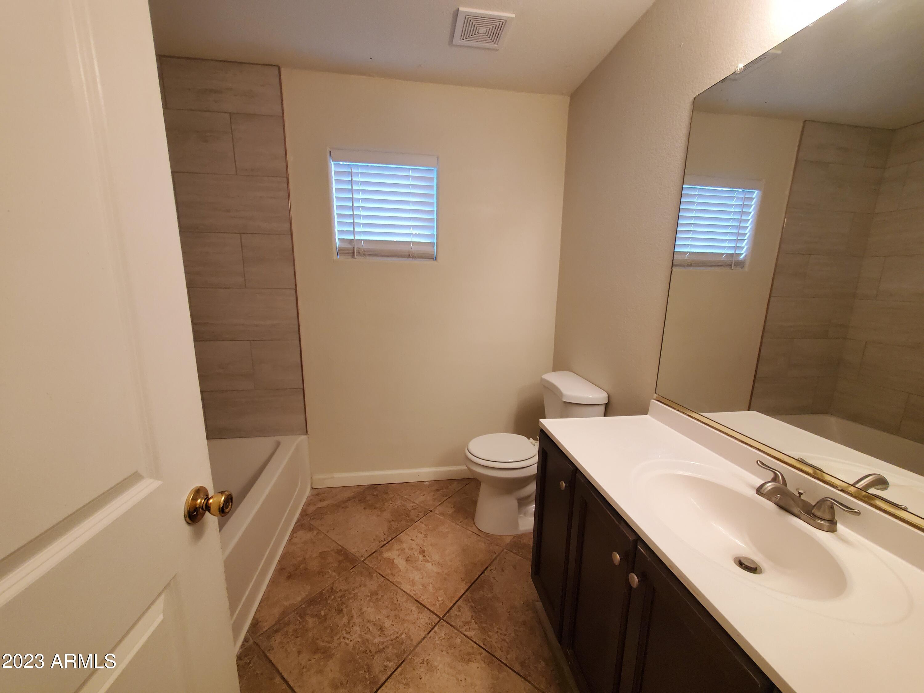 10901 W LEWIS Avenue