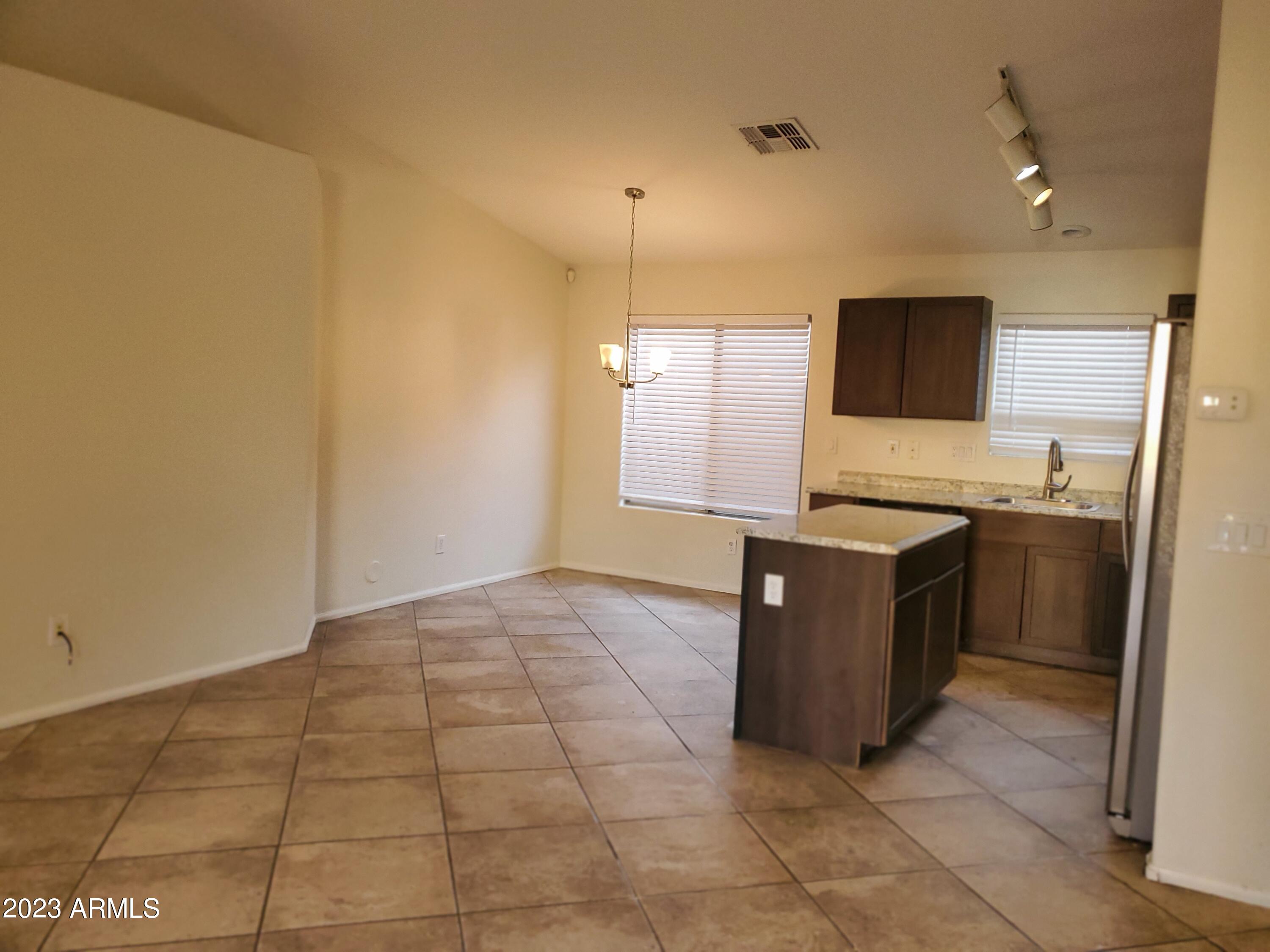 10901 W LEWIS Avenue