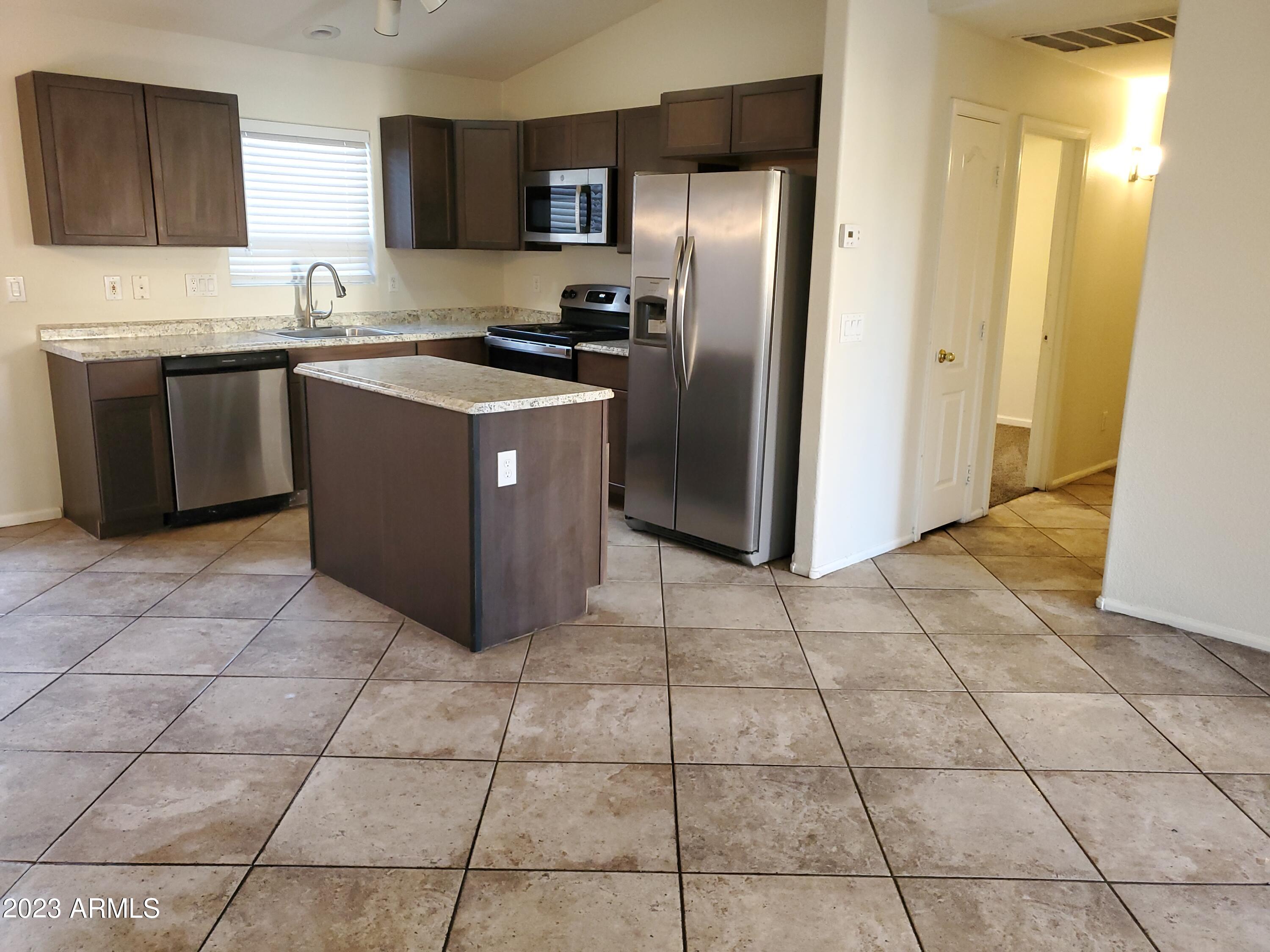 10901 W LEWIS Avenue