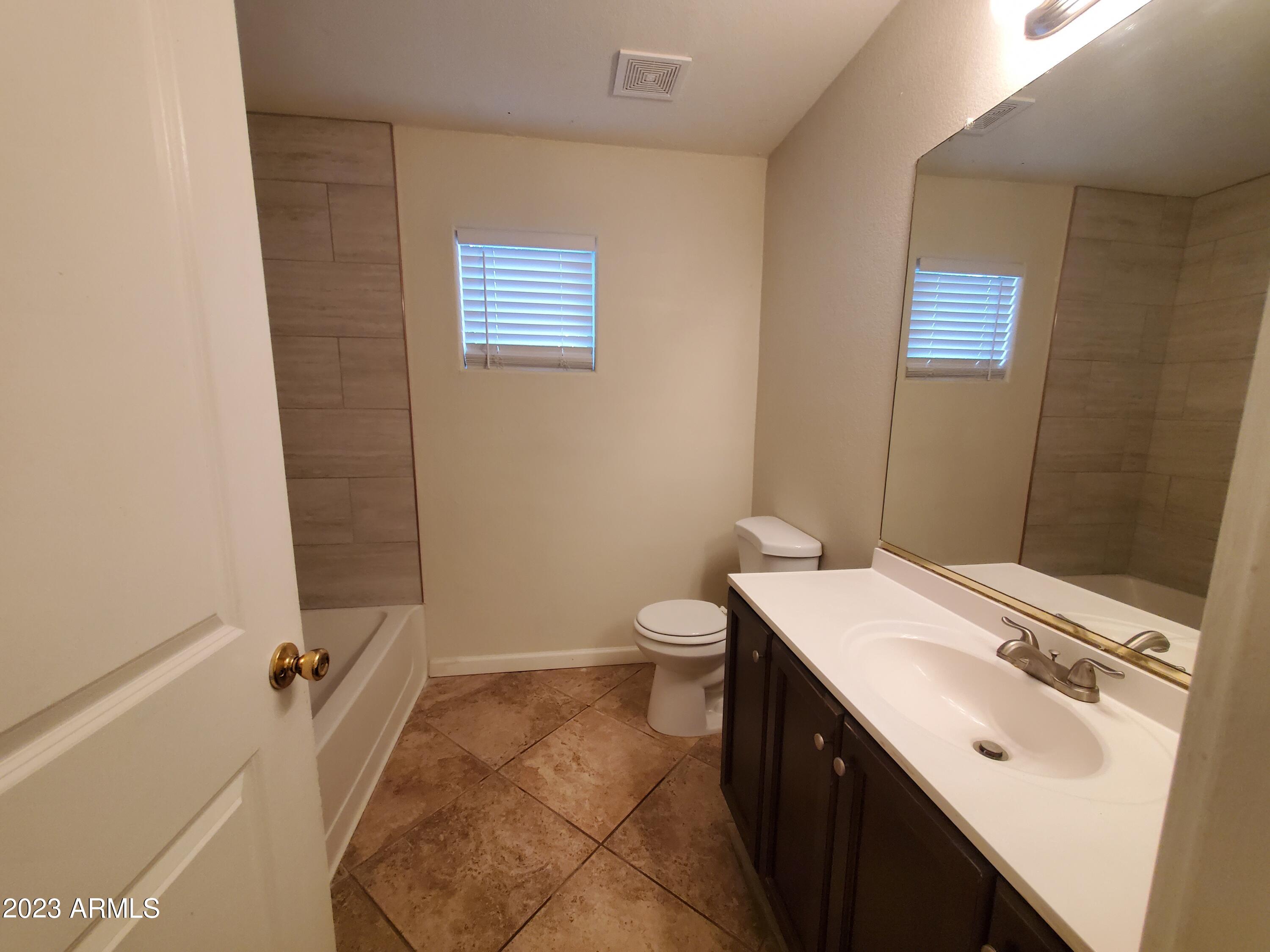 10901 W LEWIS Avenue