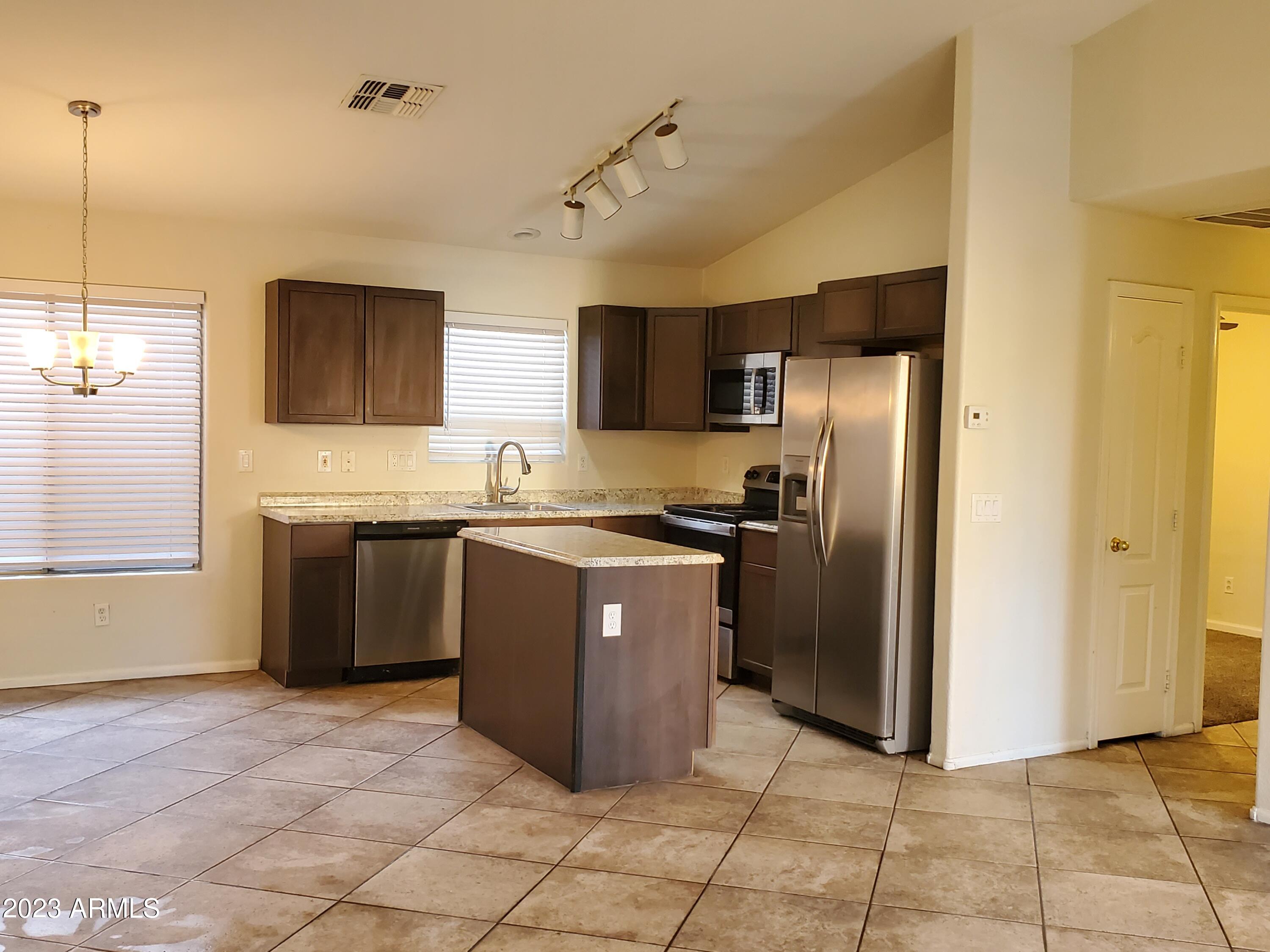 10901 W LEWIS Avenue