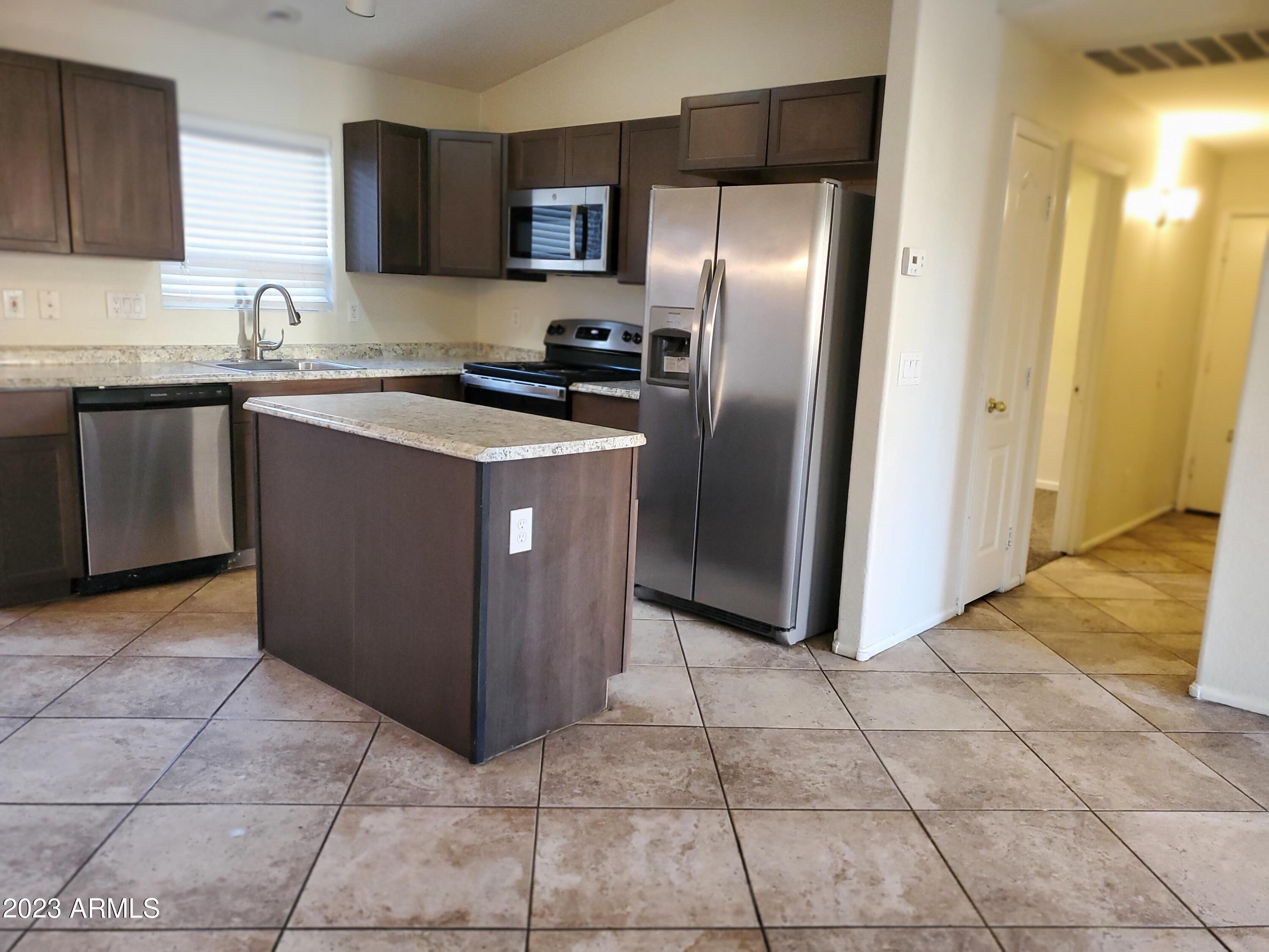 10901 W LEWIS Avenue