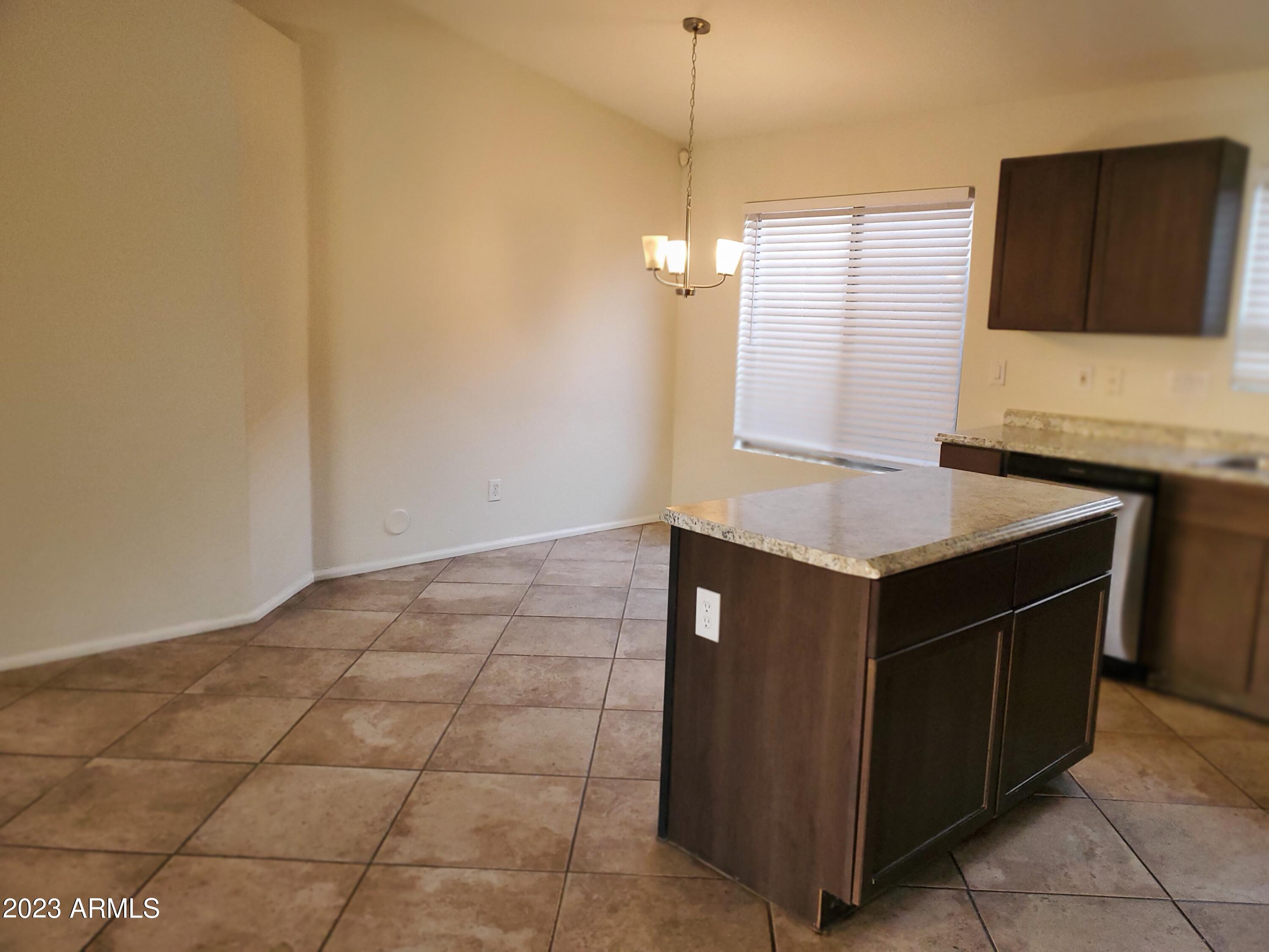 10901 W LEWIS Avenue