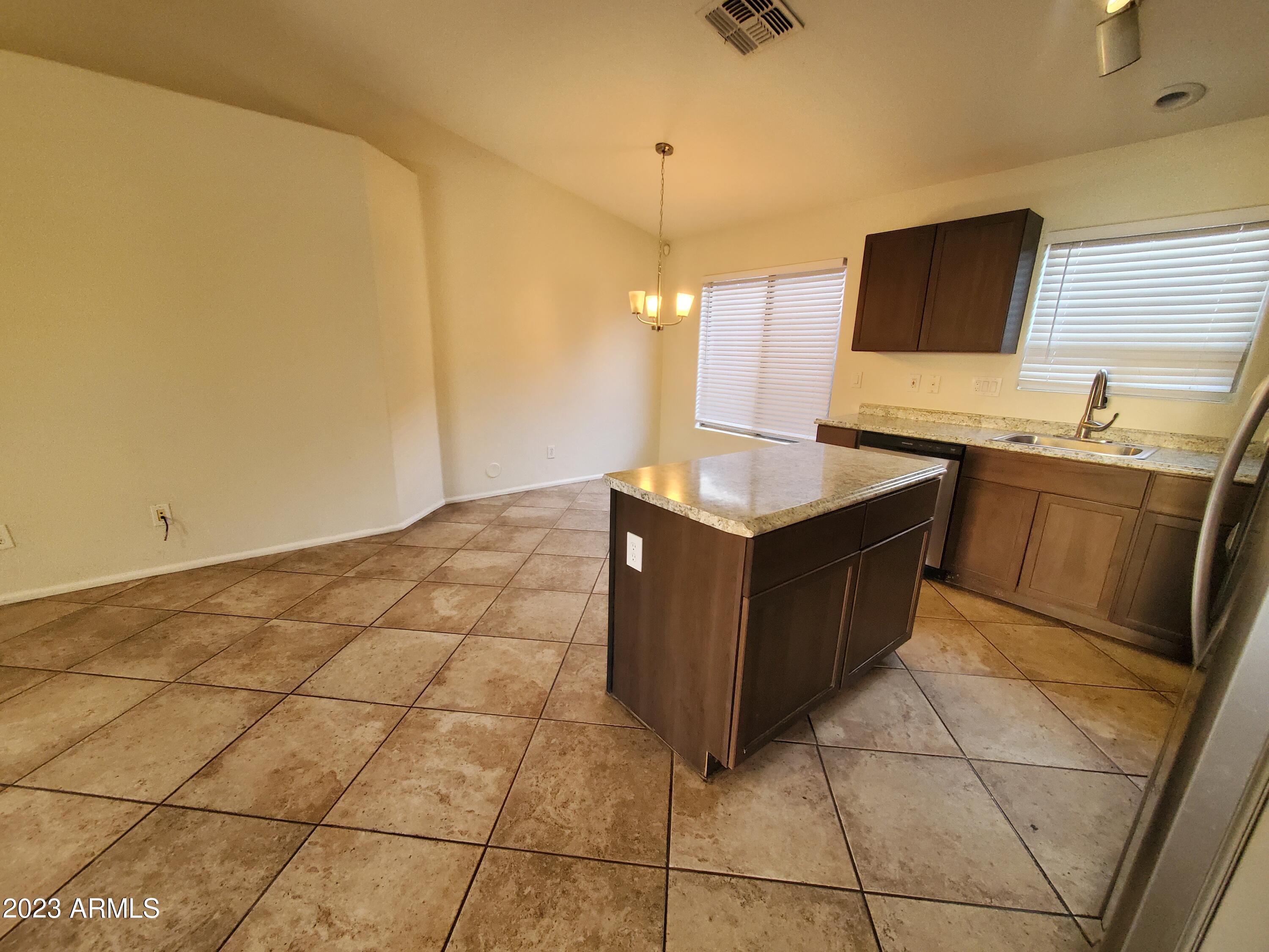 10901 W LEWIS Avenue