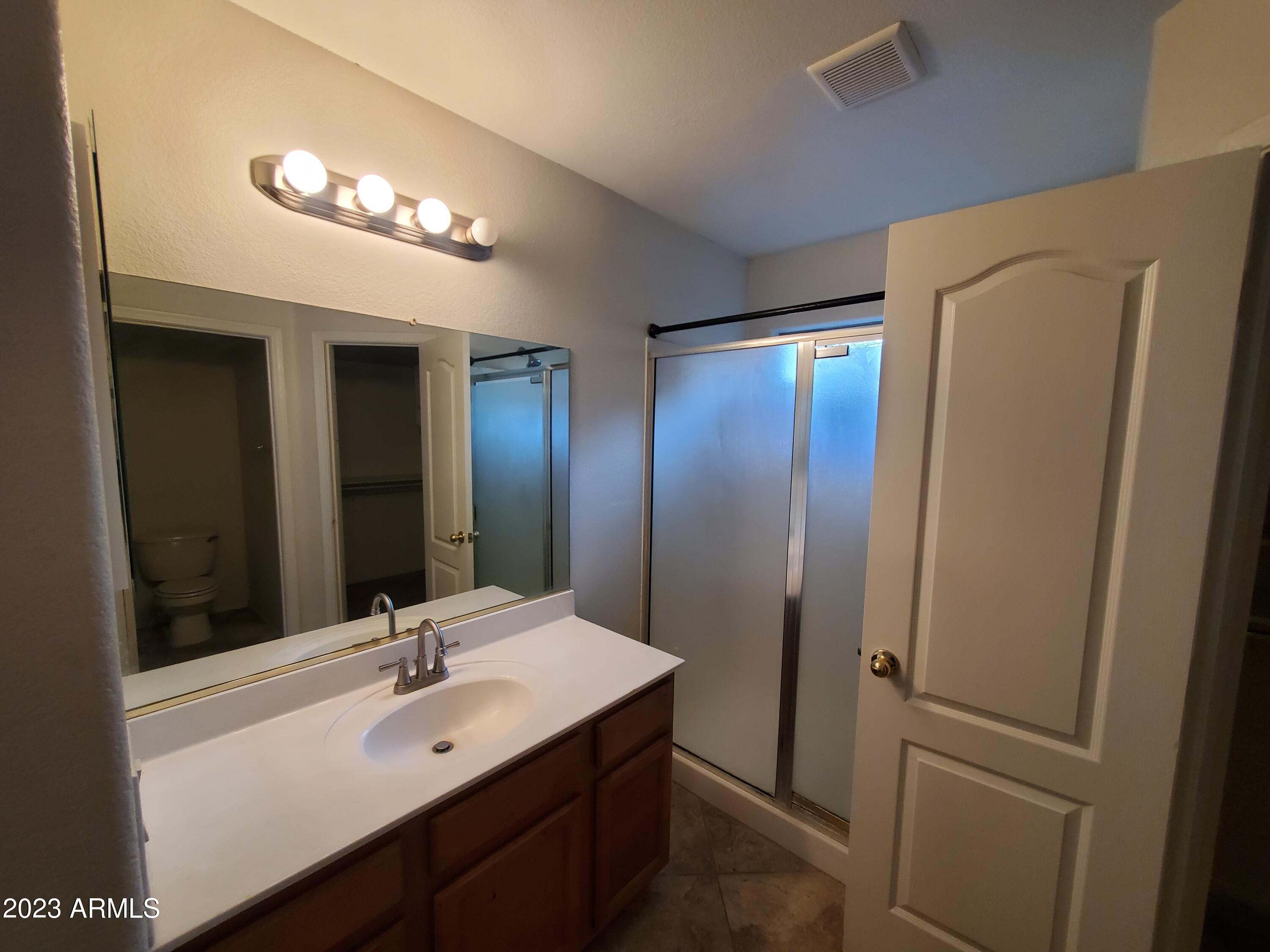 10901 W LEWIS Avenue