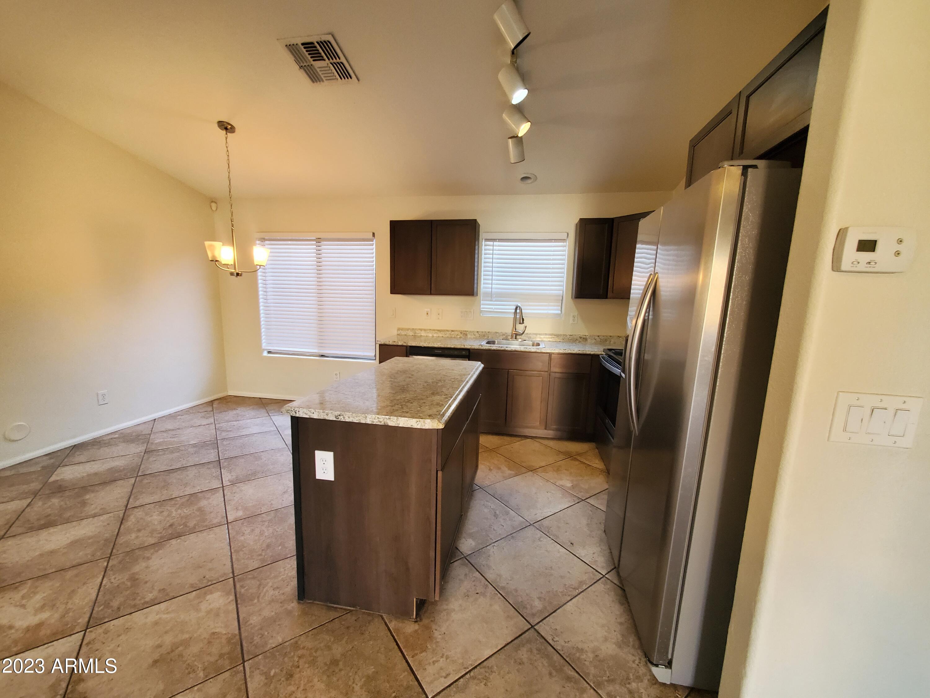 10901 W LEWIS Avenue