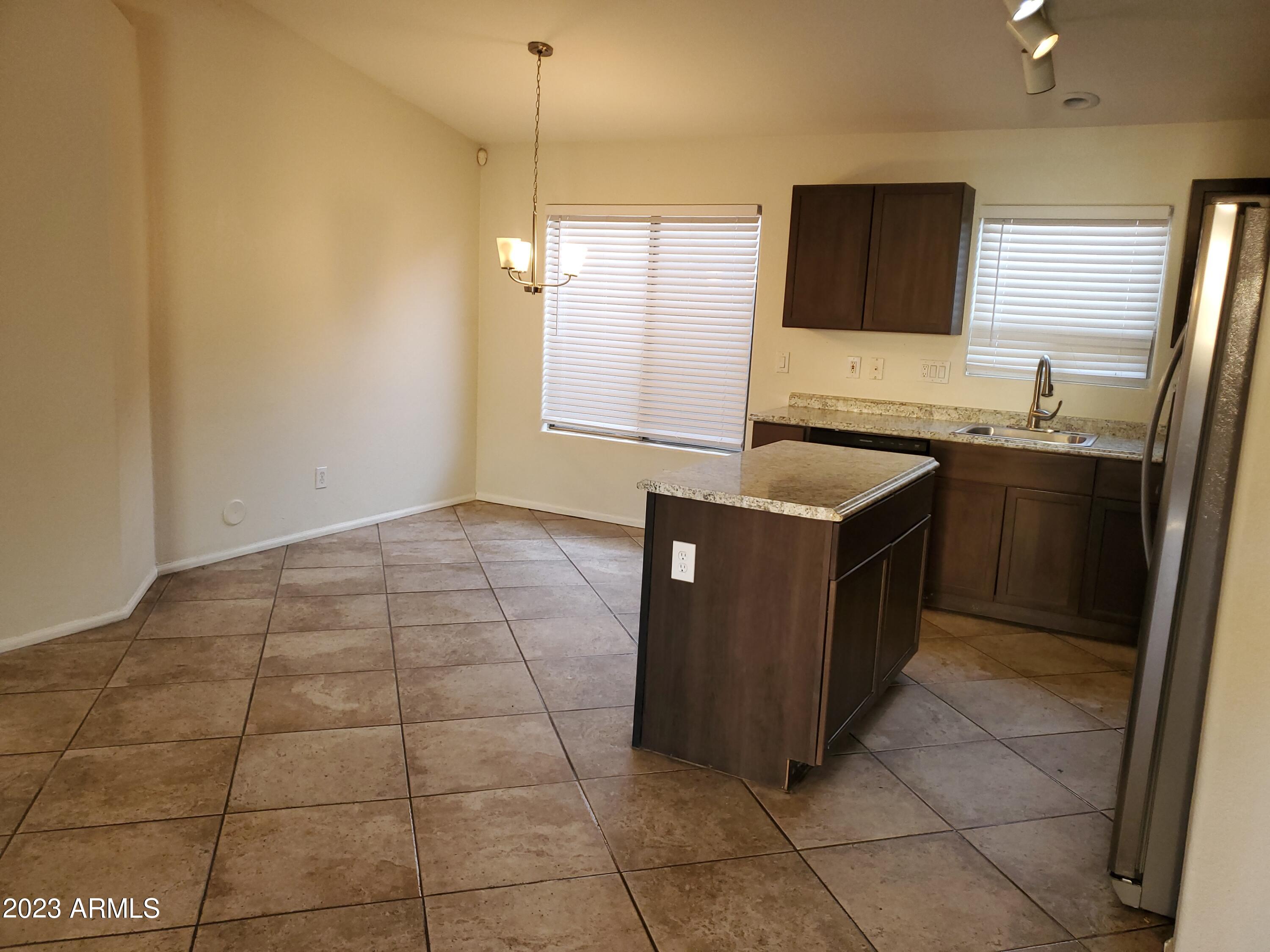 10901 W LEWIS Avenue