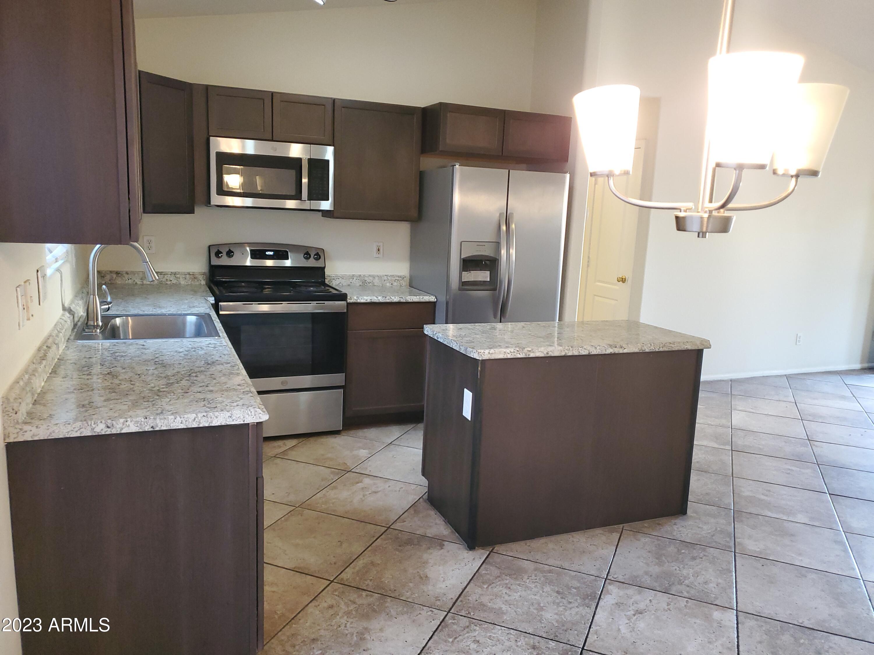 10901 W LEWIS Avenue