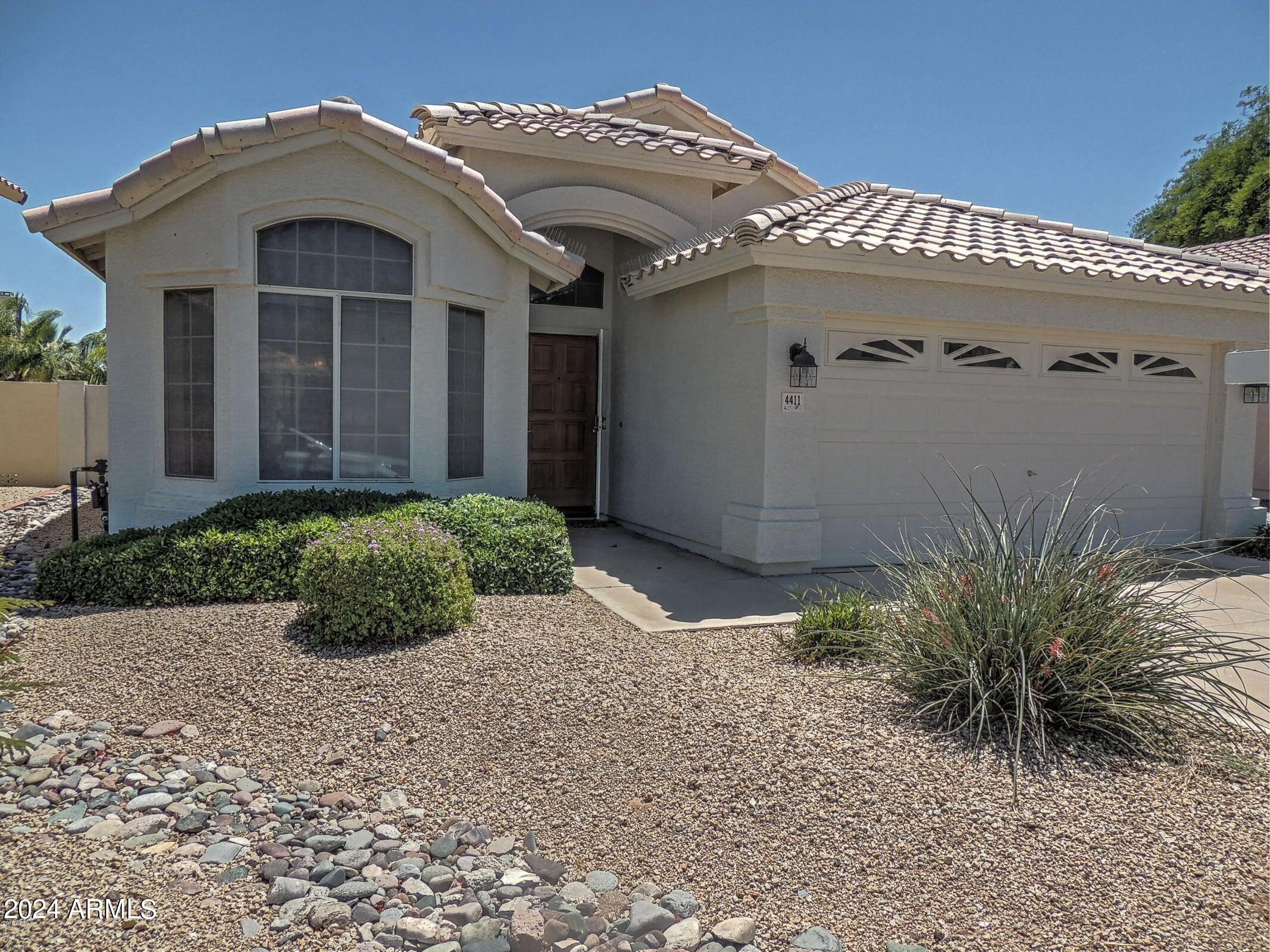 4411 E DESERT WIND Drive