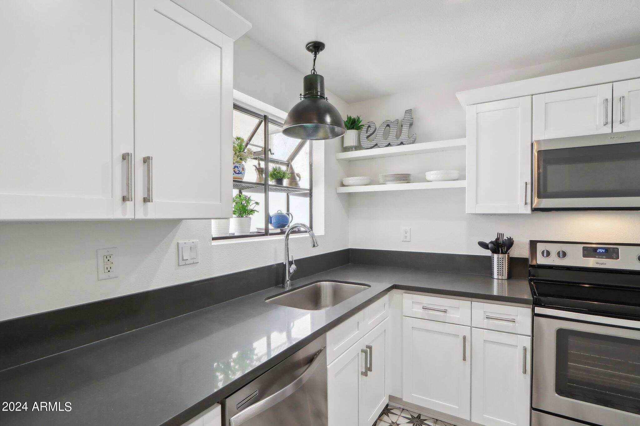 7024 E 6TH Street # 103