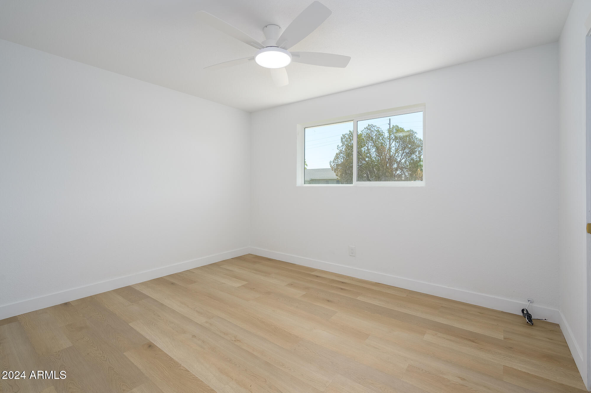 7026 E VERNON Avenue