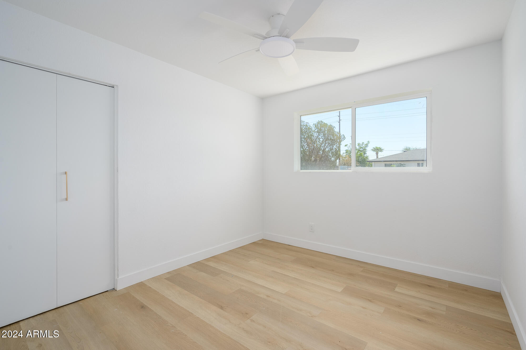 7026 E VERNON Avenue