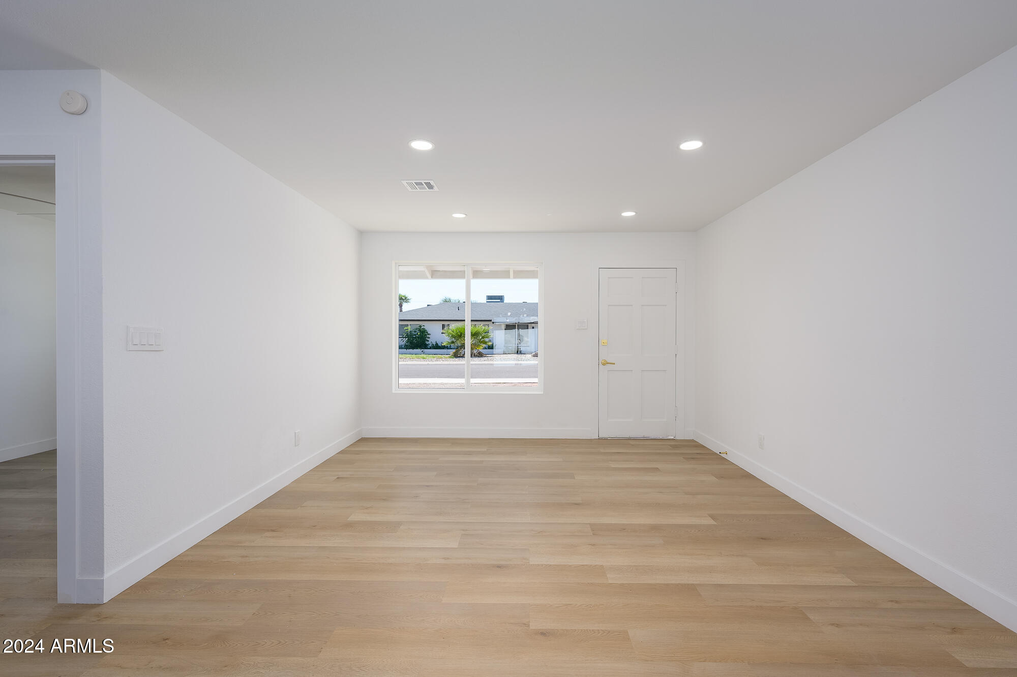 7026 E VERNON Avenue