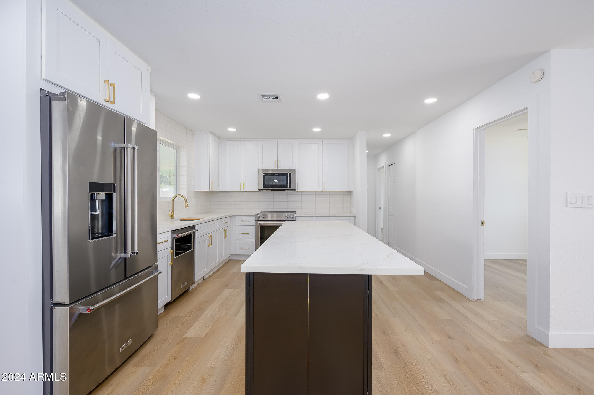 7026 E VERNON Avenue