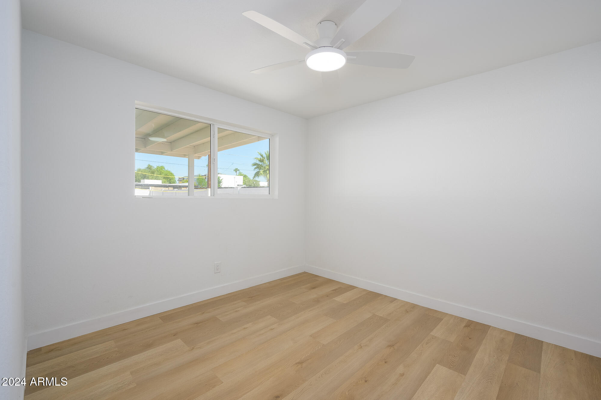 7026 E VERNON Avenue