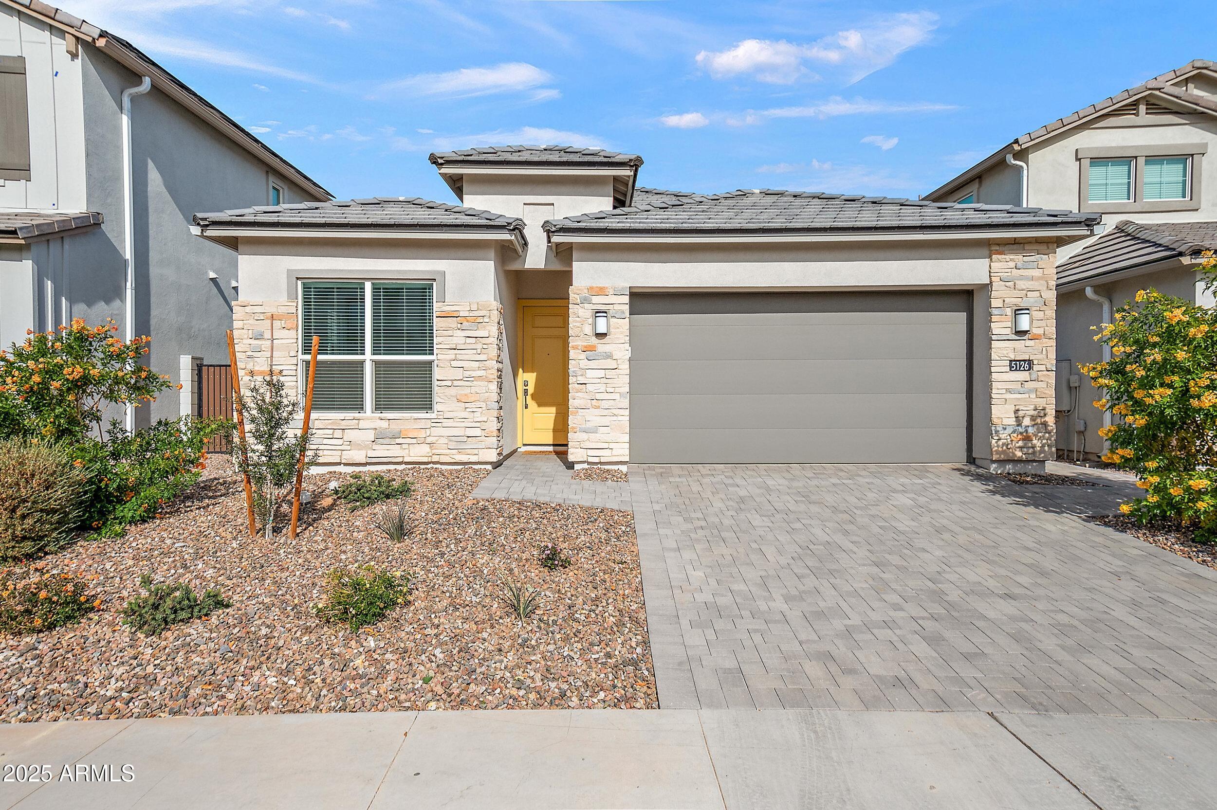 5126 E VILLAGE Drive