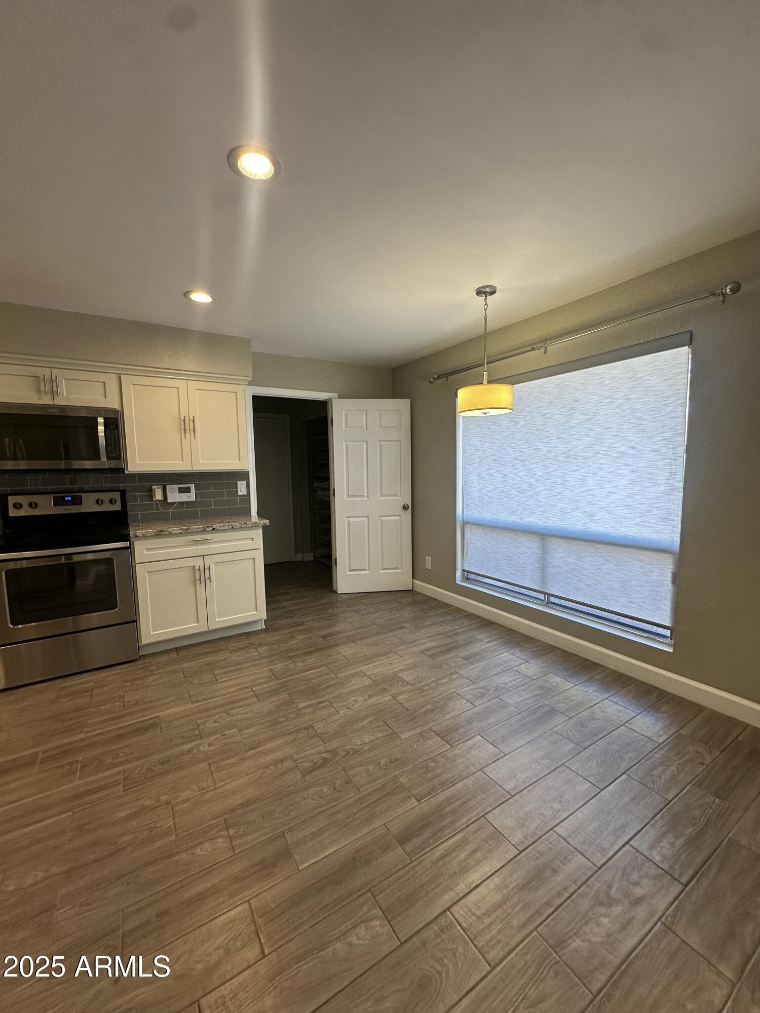 8691 E LATHAM Street