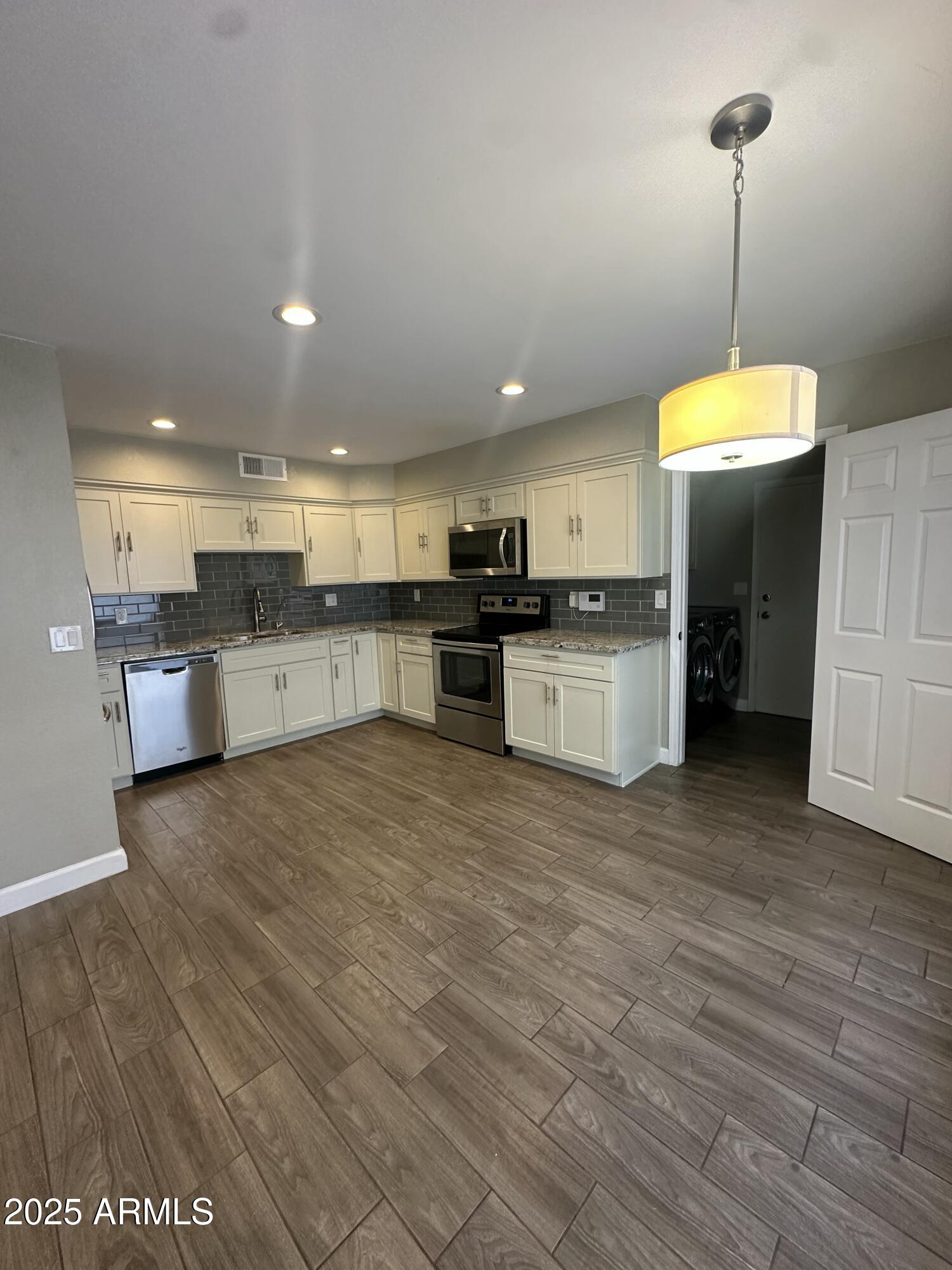 8691 E LATHAM Street