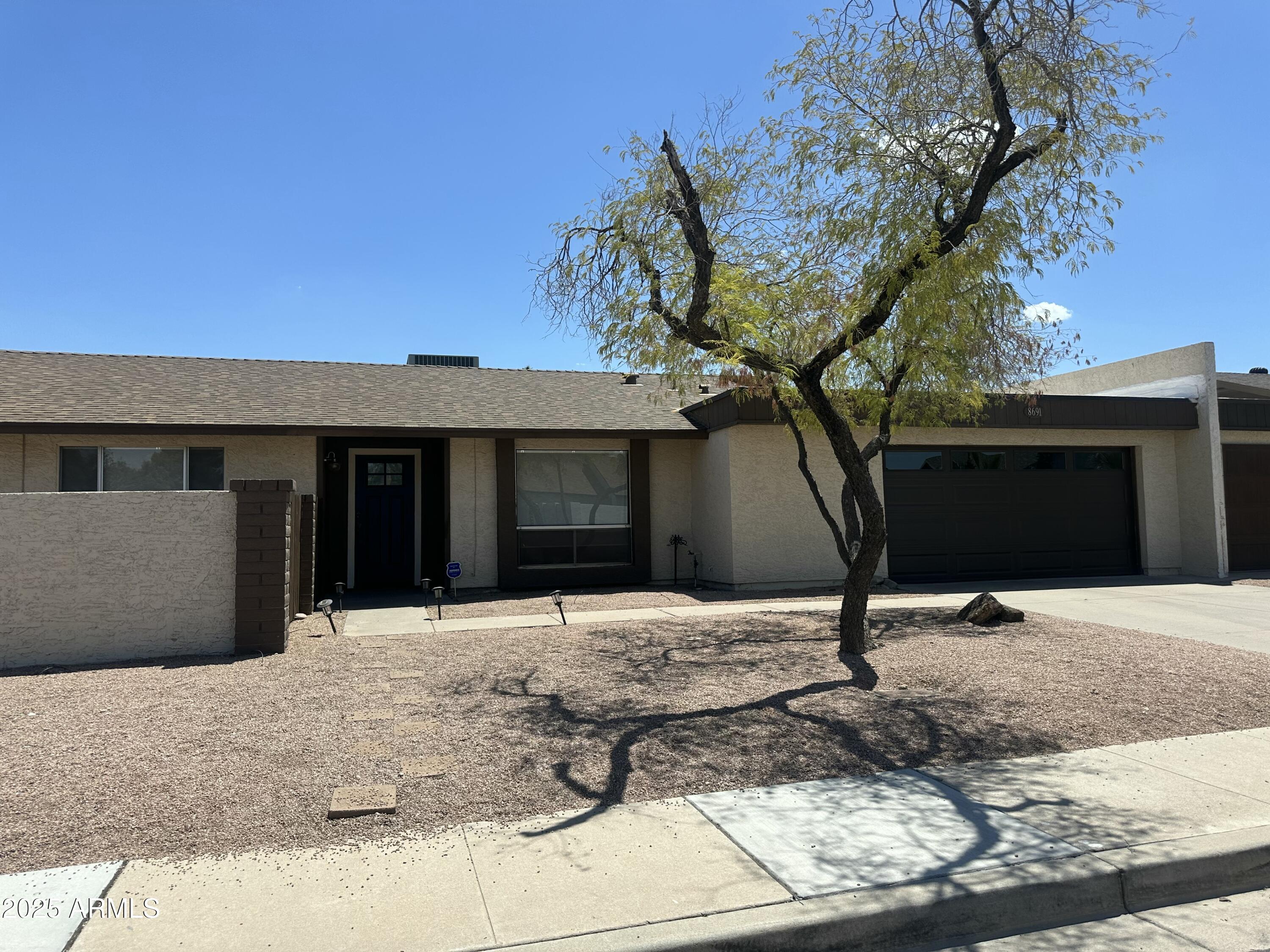 8691 E LATHAM Street