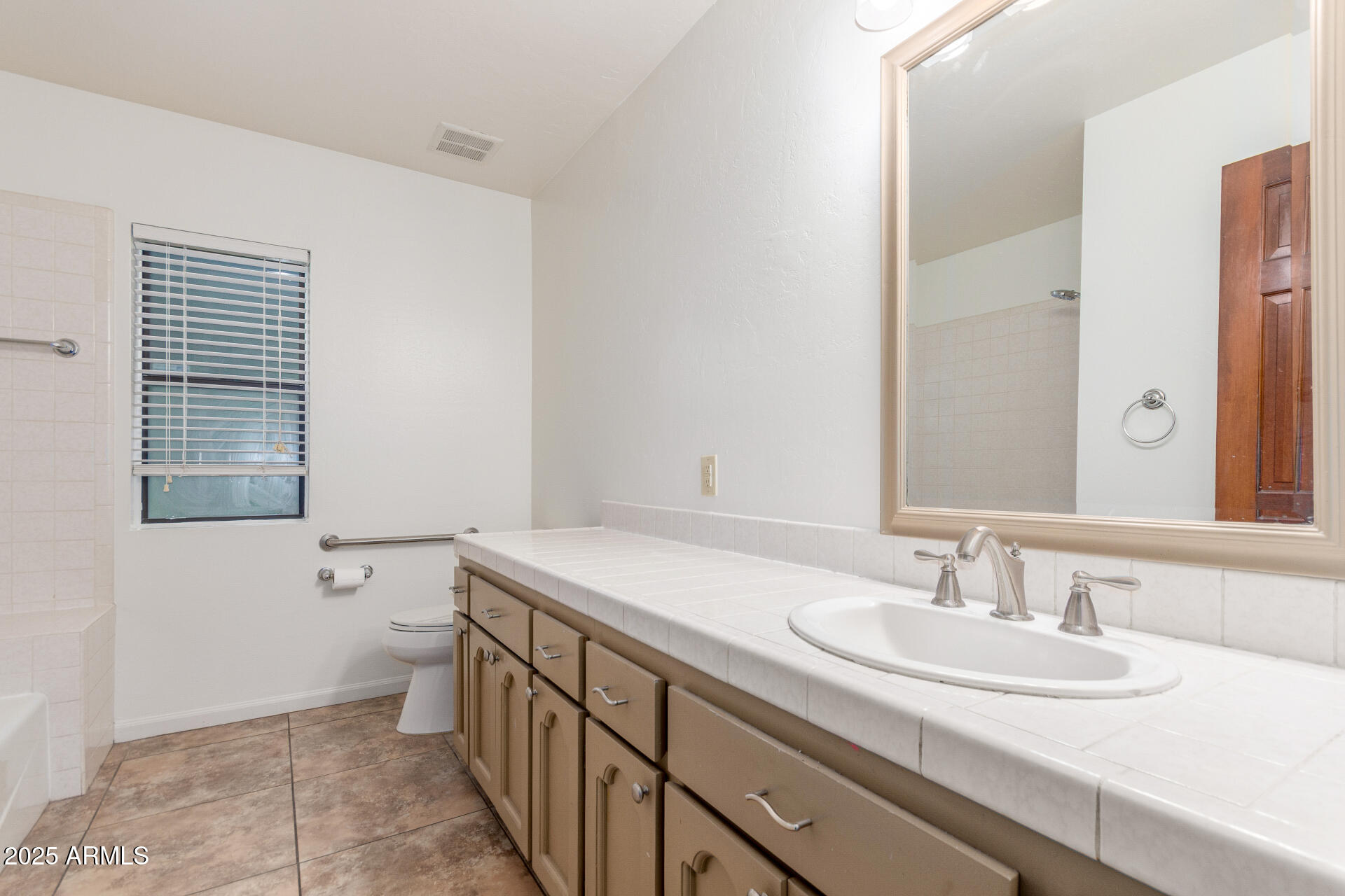 2051 E VAUGHN Street