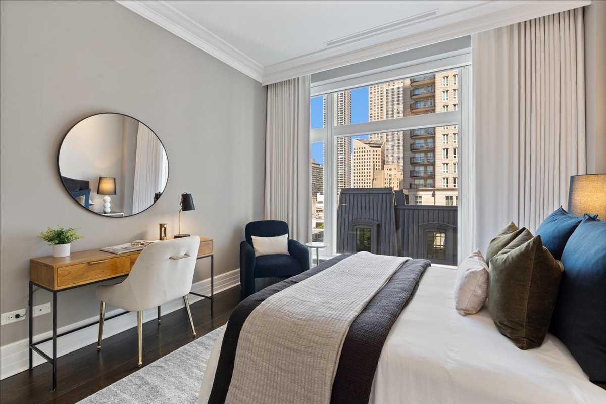 9 W Walton Street Unit: 702