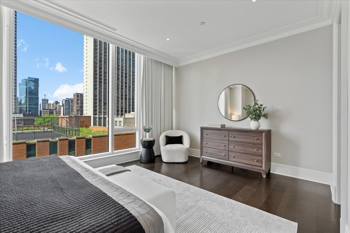 9 W Walton Street Unit: 702