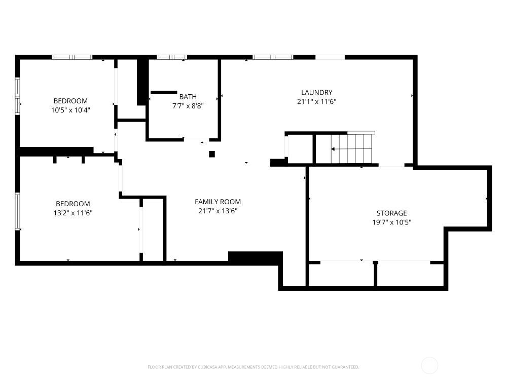 Floor plan with two bedrooms, a family room, laundry, bathroom, and storage area.