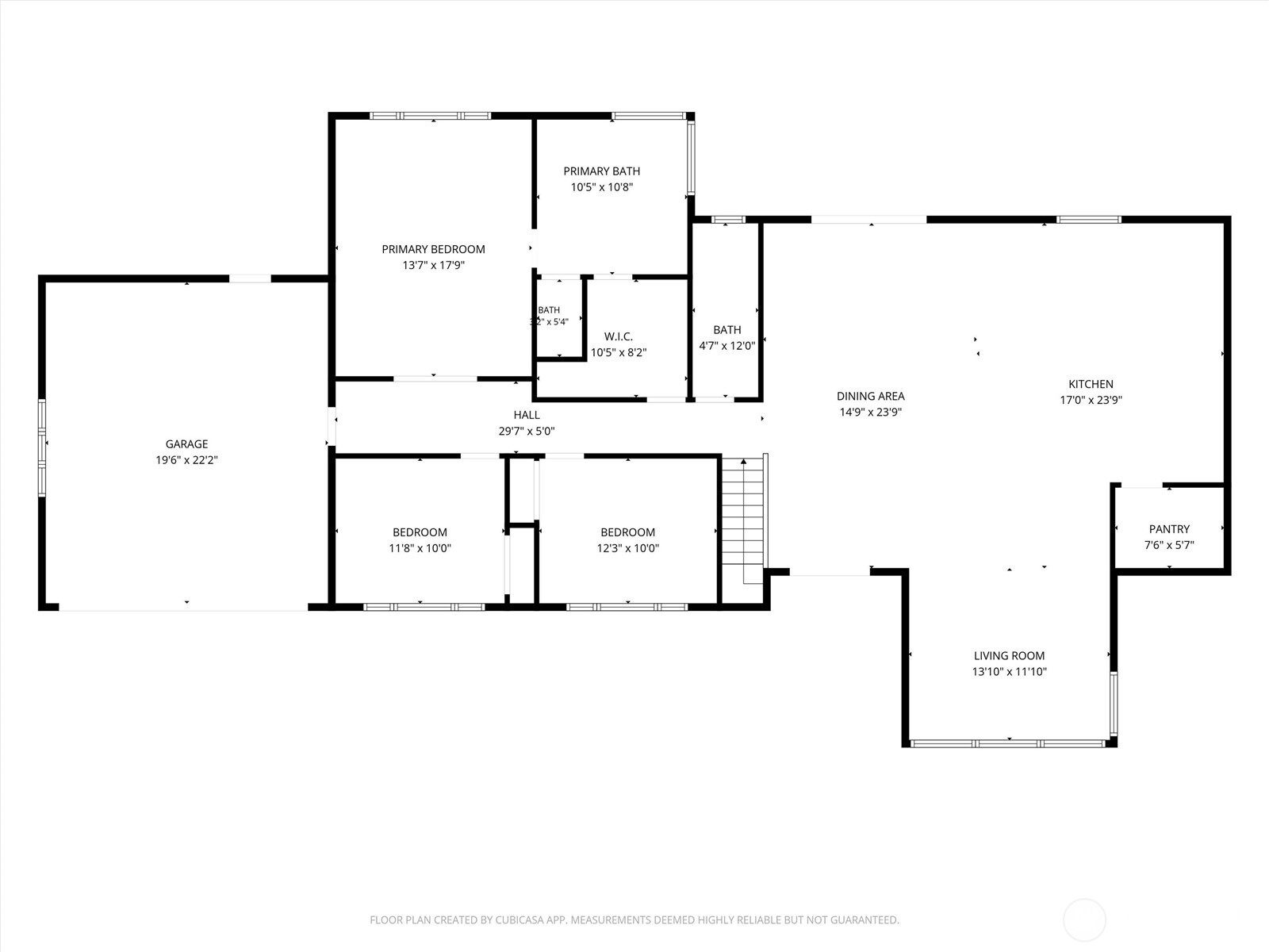 Floor plan showing three bedrooms, garage, kitchen, dining area, living room, and room dimensions.