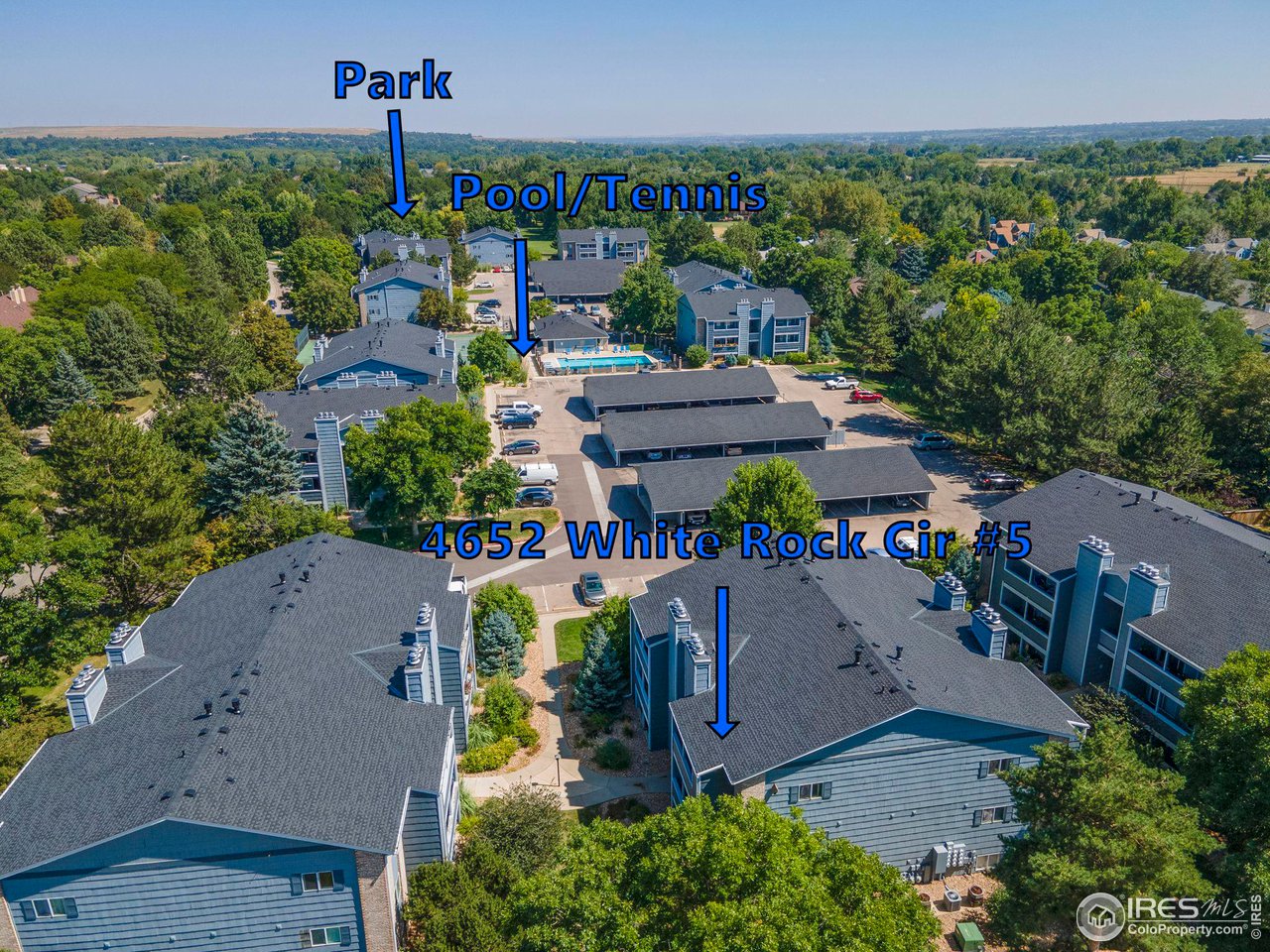 Aerial view of the condominium complex, with the unit, pool and tennis courts, and nearby park marked.