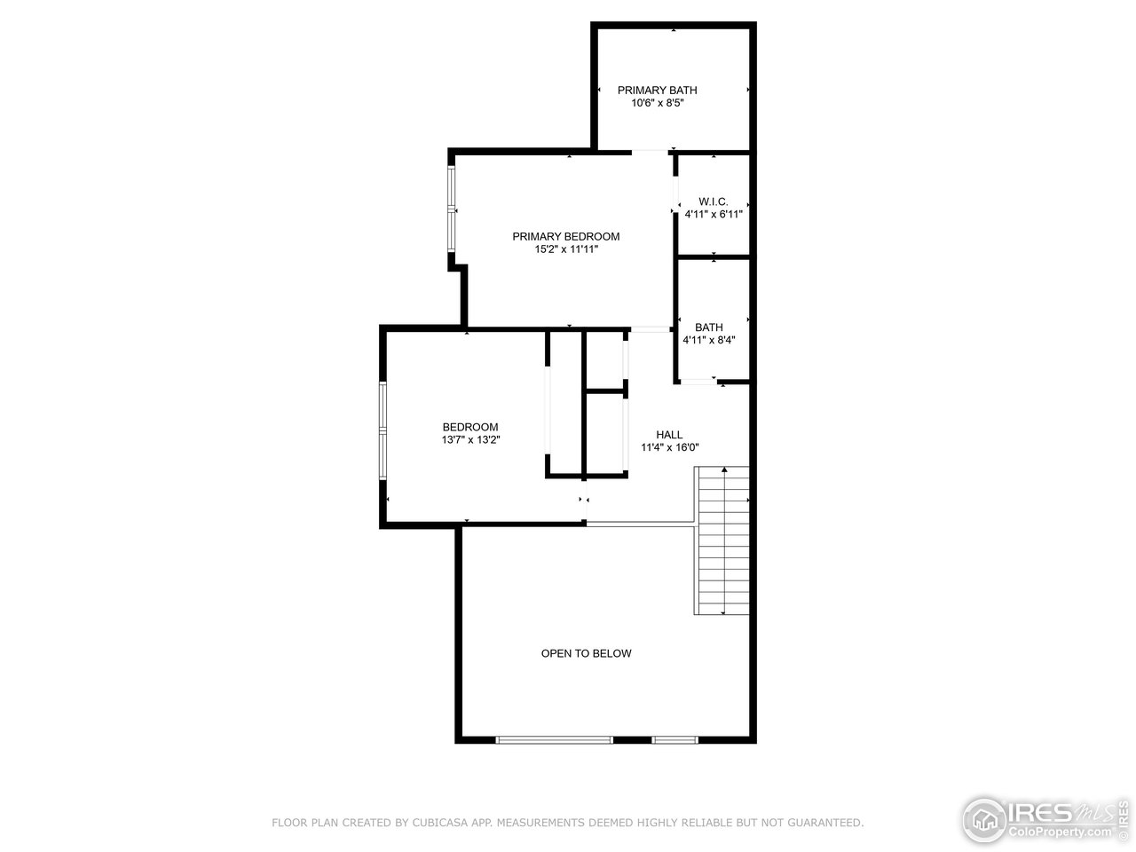 Upper-level floor plan with two bedrooms, two baths, stairs, and an open-to-below area.
