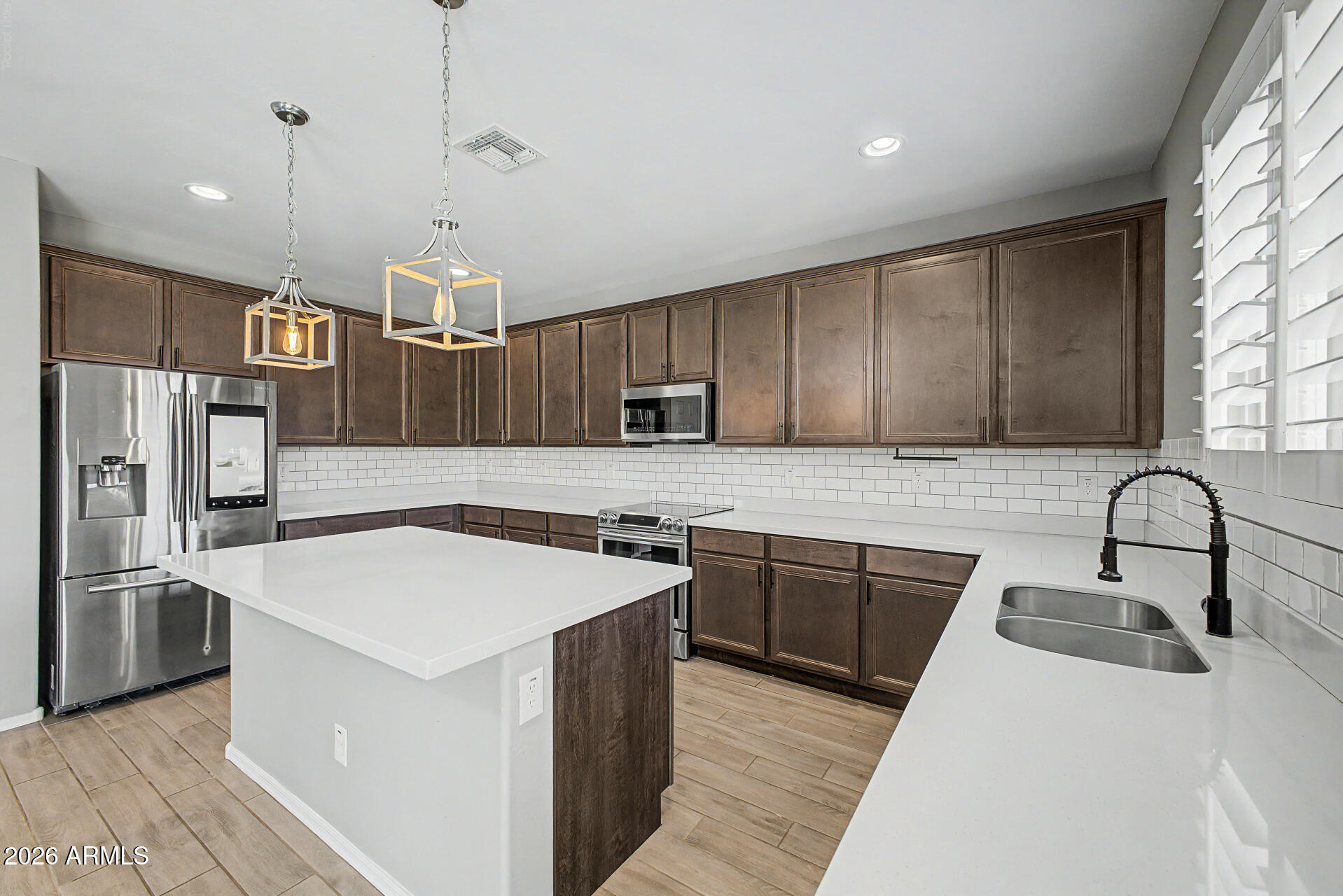 18040 W LOUISE Drive