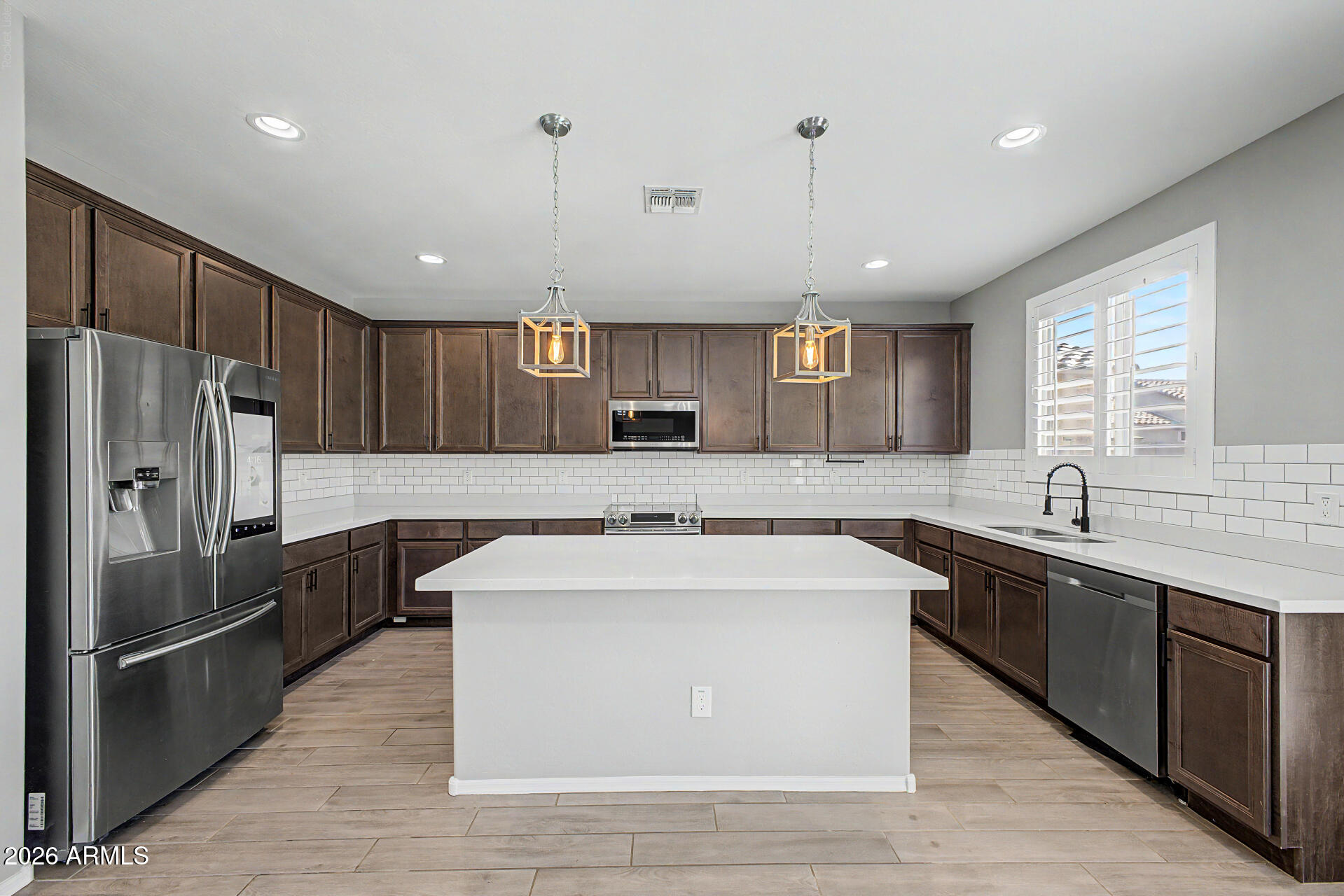 18040 W LOUISE Drive