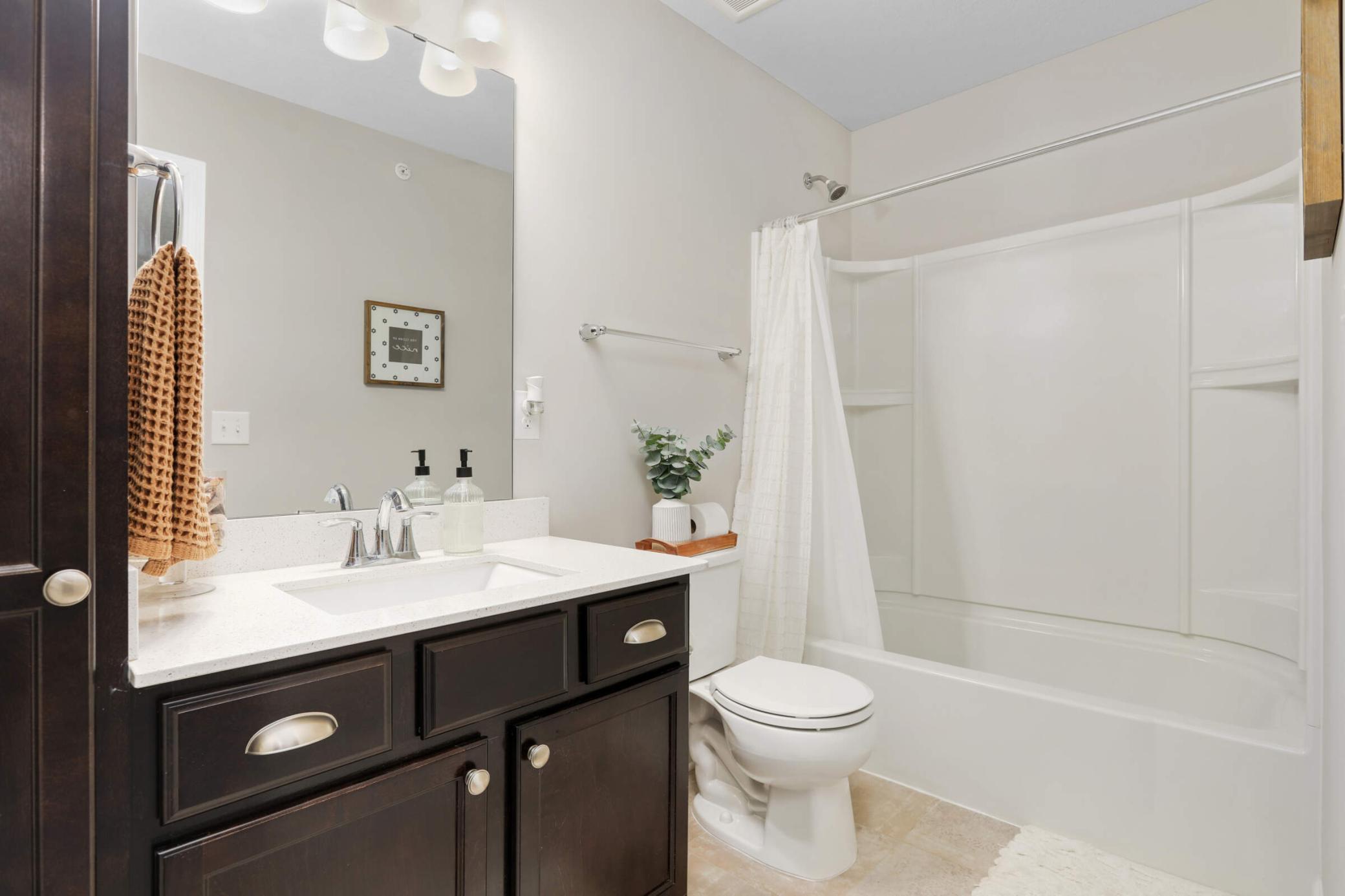 9909 5th Street Lane N