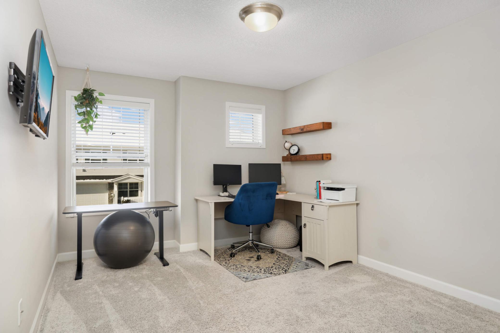 9909 5th Street Lane N