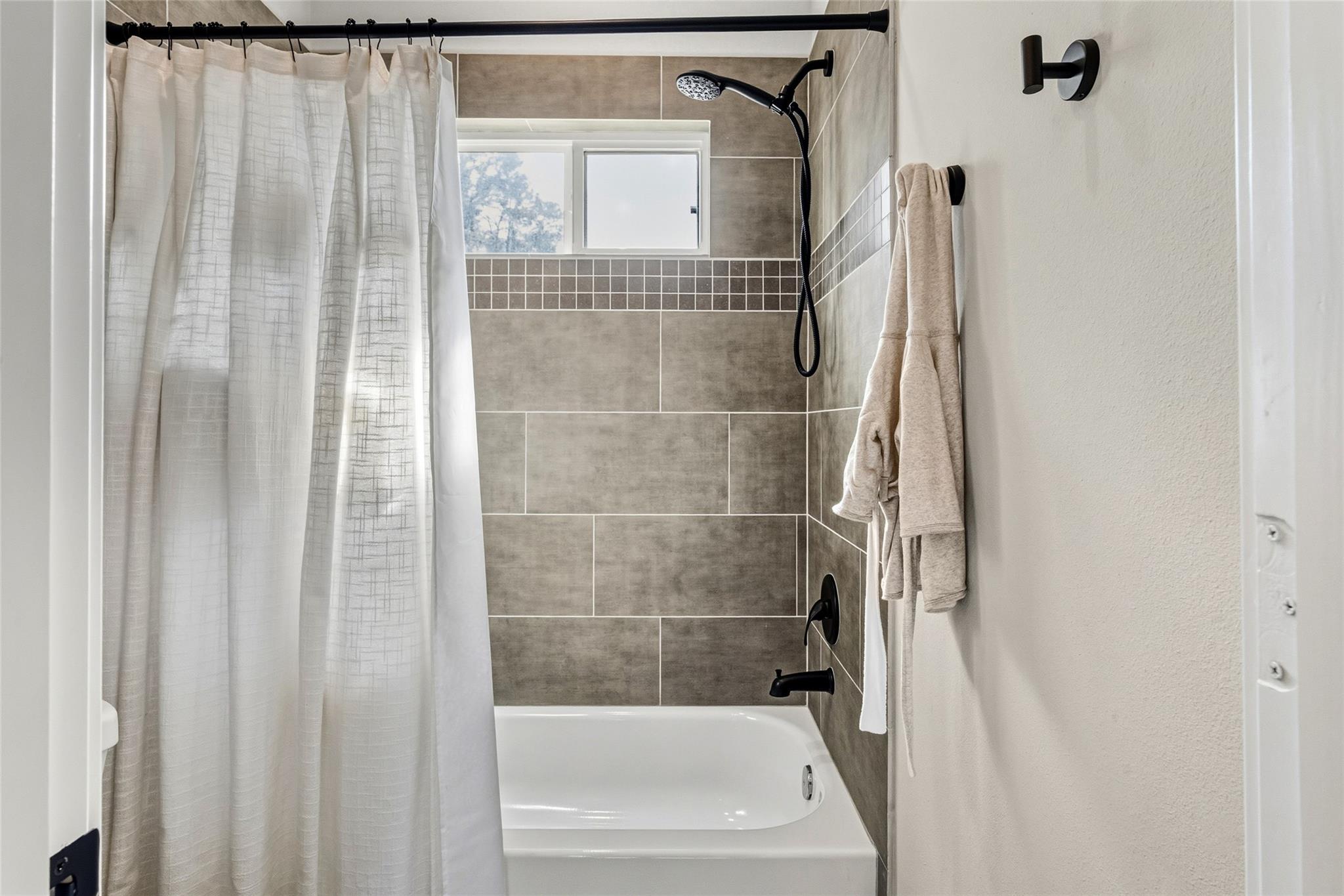 5202 Pinemont Creek Lane