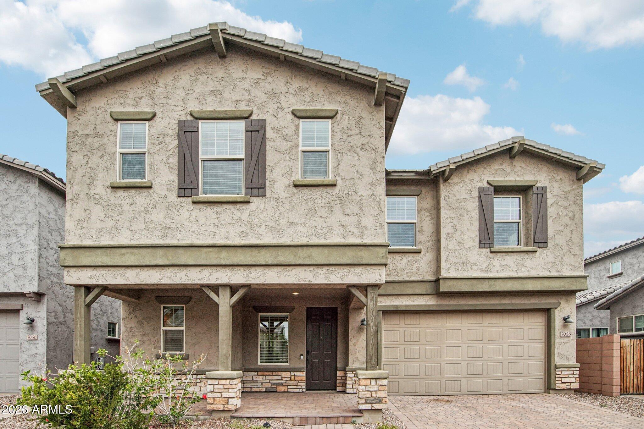 7058 E AINSLEY MAY Way