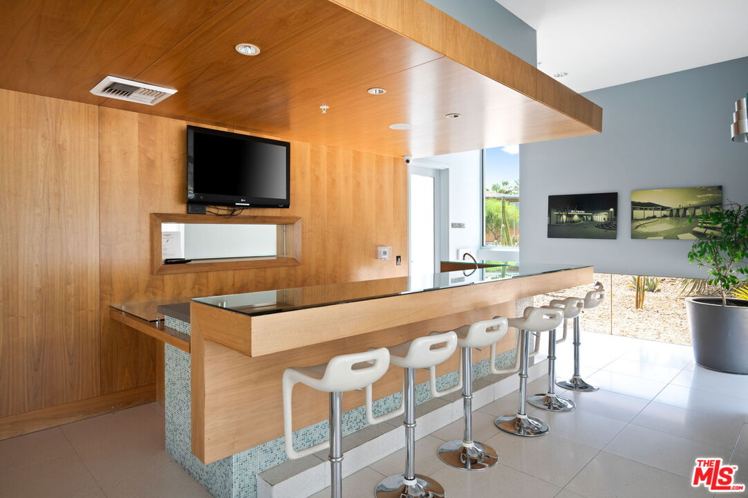 910 E Palm Canyon Dr Unit: 205