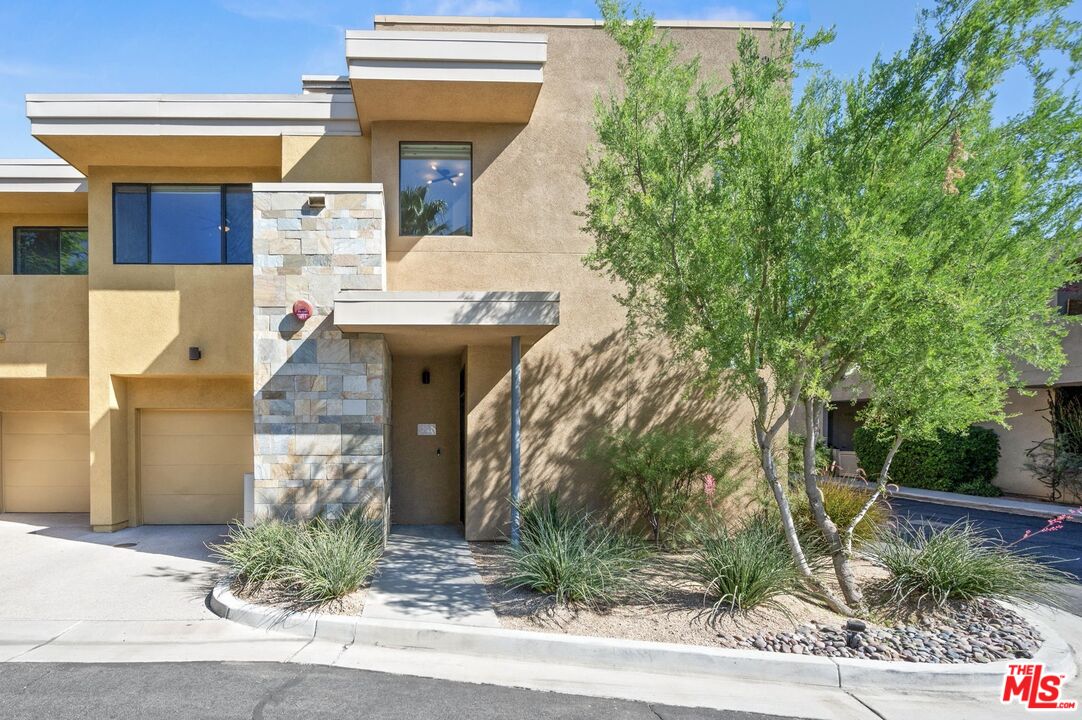 910 E Palm Canyon Dr Unit: 205