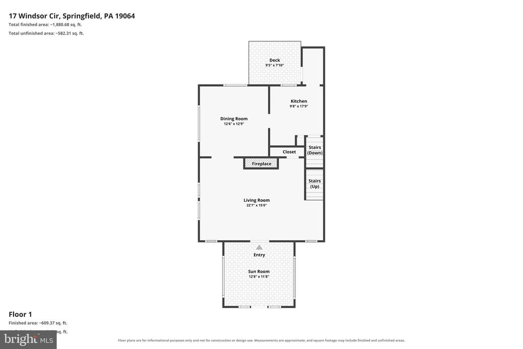 First-floor plan showing living and dining rooms, kitchen, sunroom, and deck.
