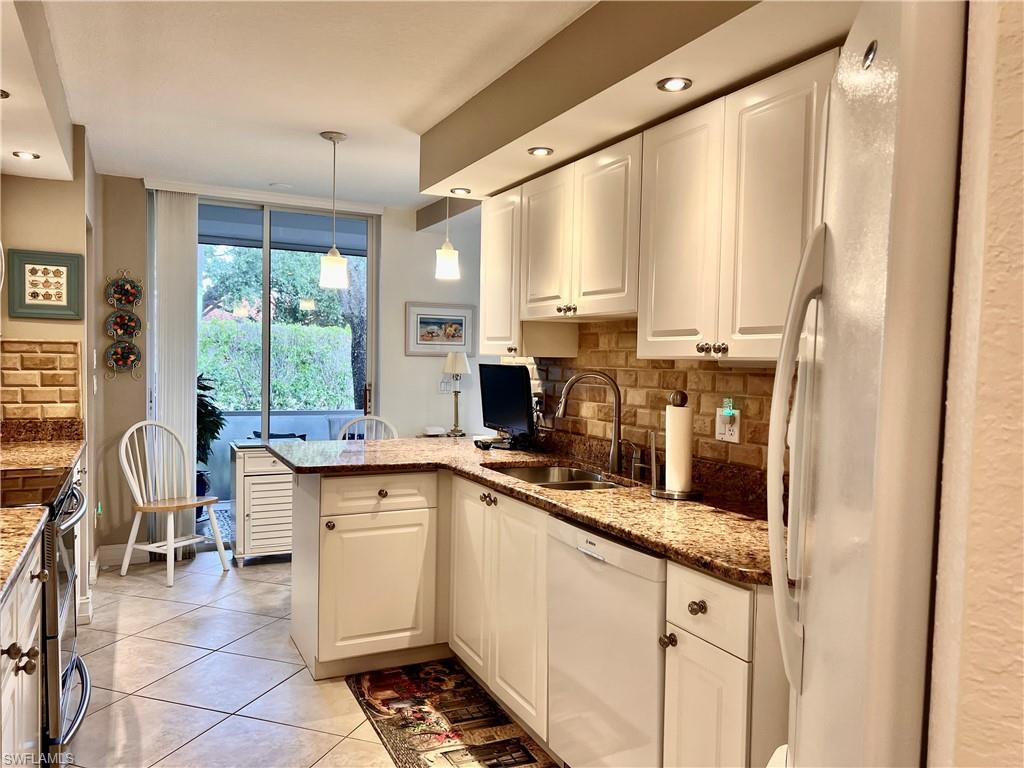 3871 WINDWARD PASSAGE CIR # 102