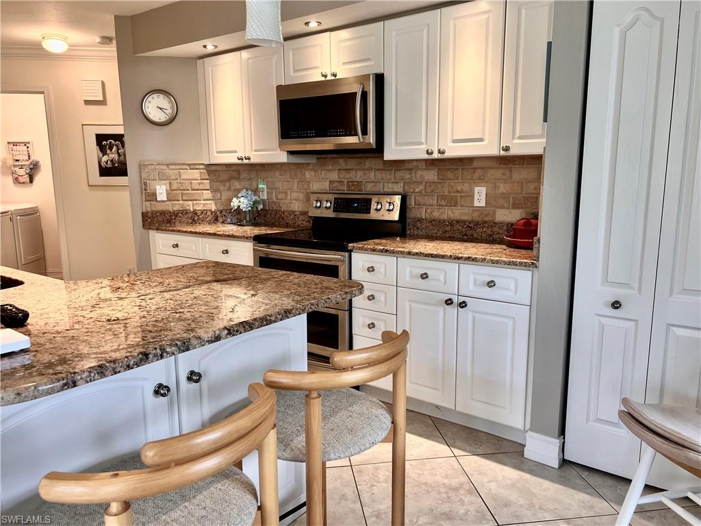 3871 WINDWARD PASSAGE CIR # 102