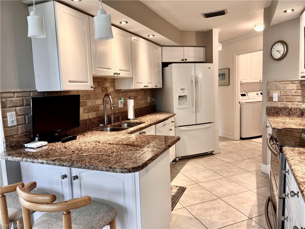 3871 WINDWARD PASSAGE CIR # 102
