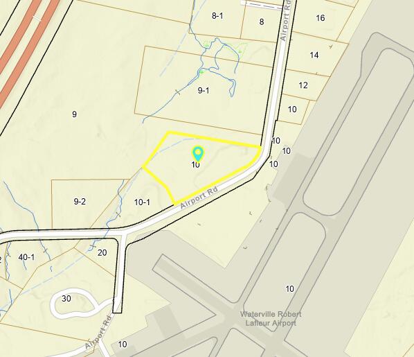 Map with parcel 10 outlined in yellow along Airport Rd near Waterville Robert Lafleur Airport.