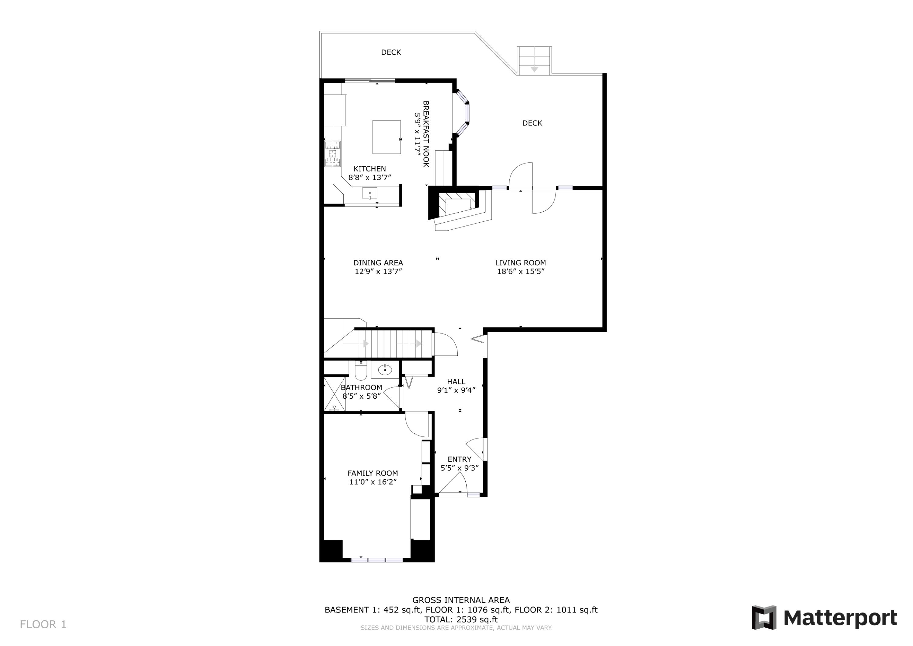 Floor 1 plan showing the kitchen, living and dining areas, family room, bathroom, and two decks.