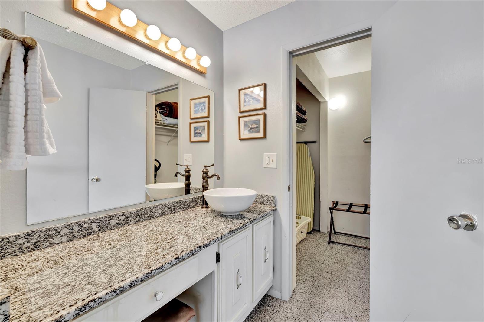 6157 MIDNIGHT PASS RD #E24