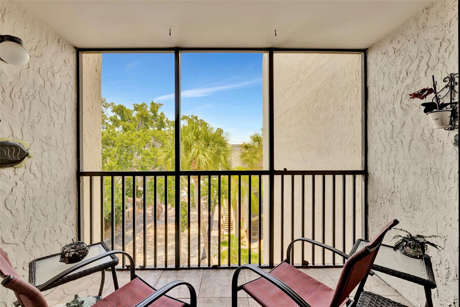 6157 MIDNIGHT PASS RD #E24