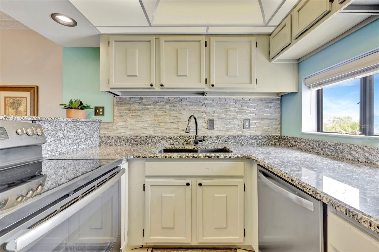 6157 MIDNIGHT PASS RD #E24