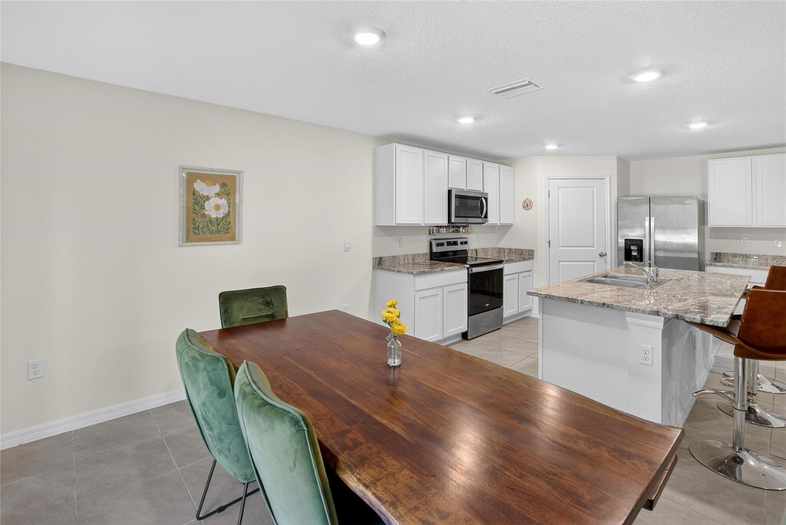 7751 ROSEWOOD GARDEN LOOP